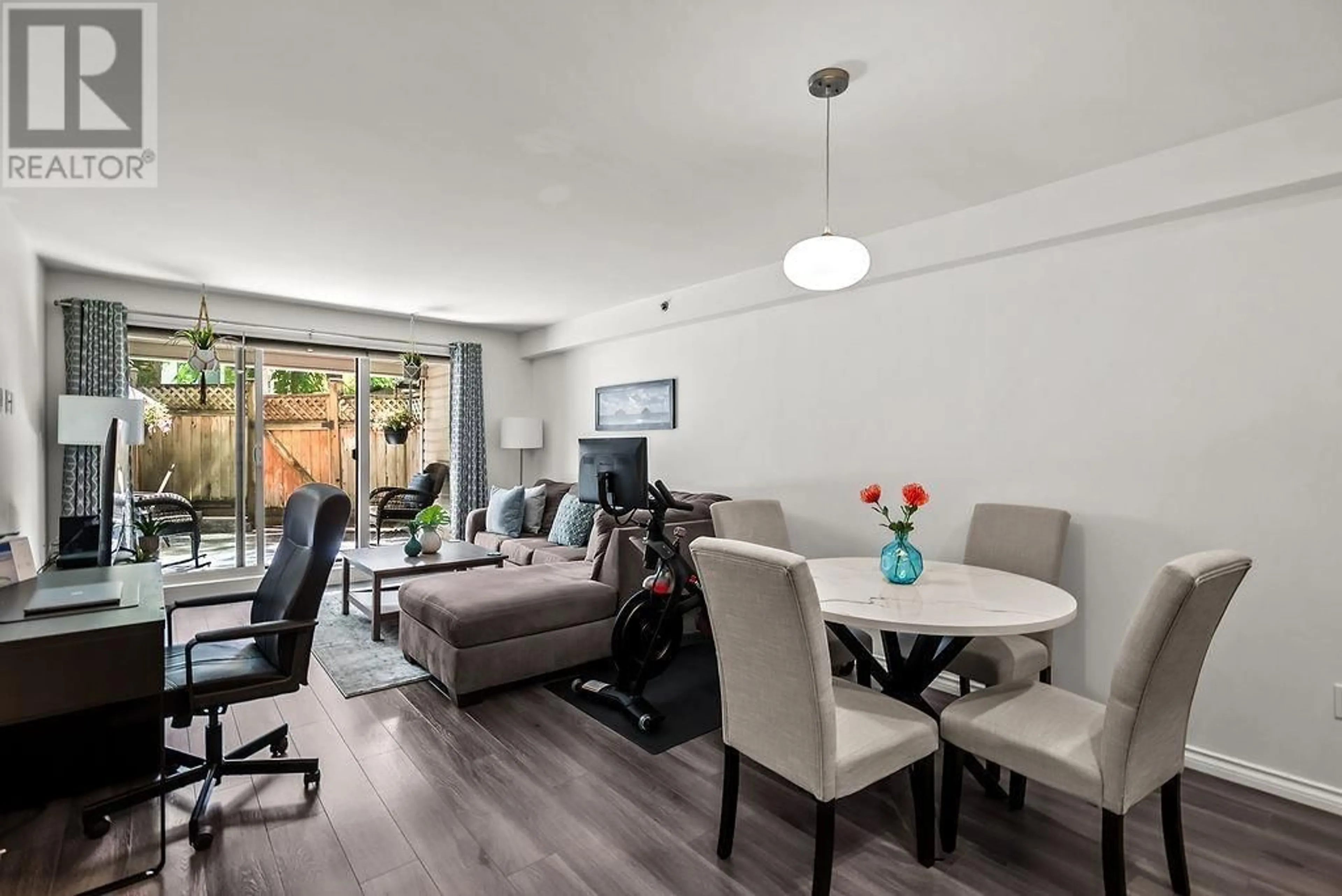 Living room with furniture, wood/laminate floor for 106 - 825 7TH AVENUE, Vancouver British Columbia V5T1P4
