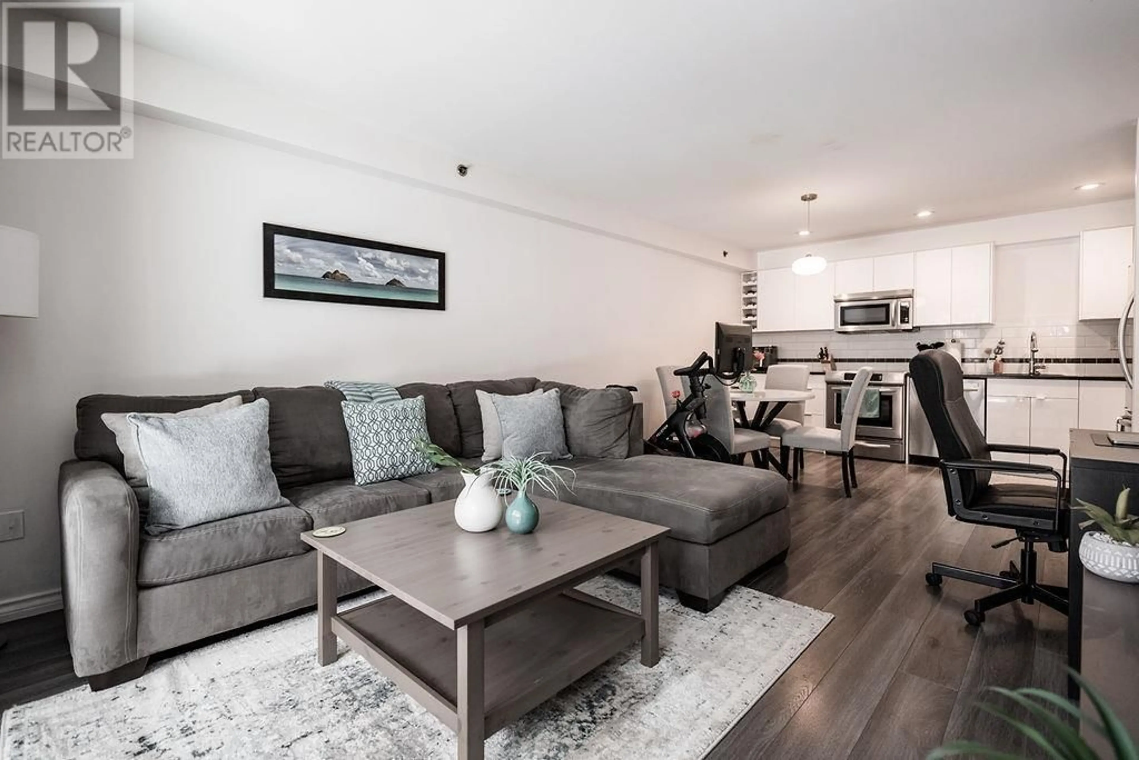 Living room with furniture, wood/laminate floor for 106 - 825 7TH AVENUE, Vancouver British Columbia V5T1P4