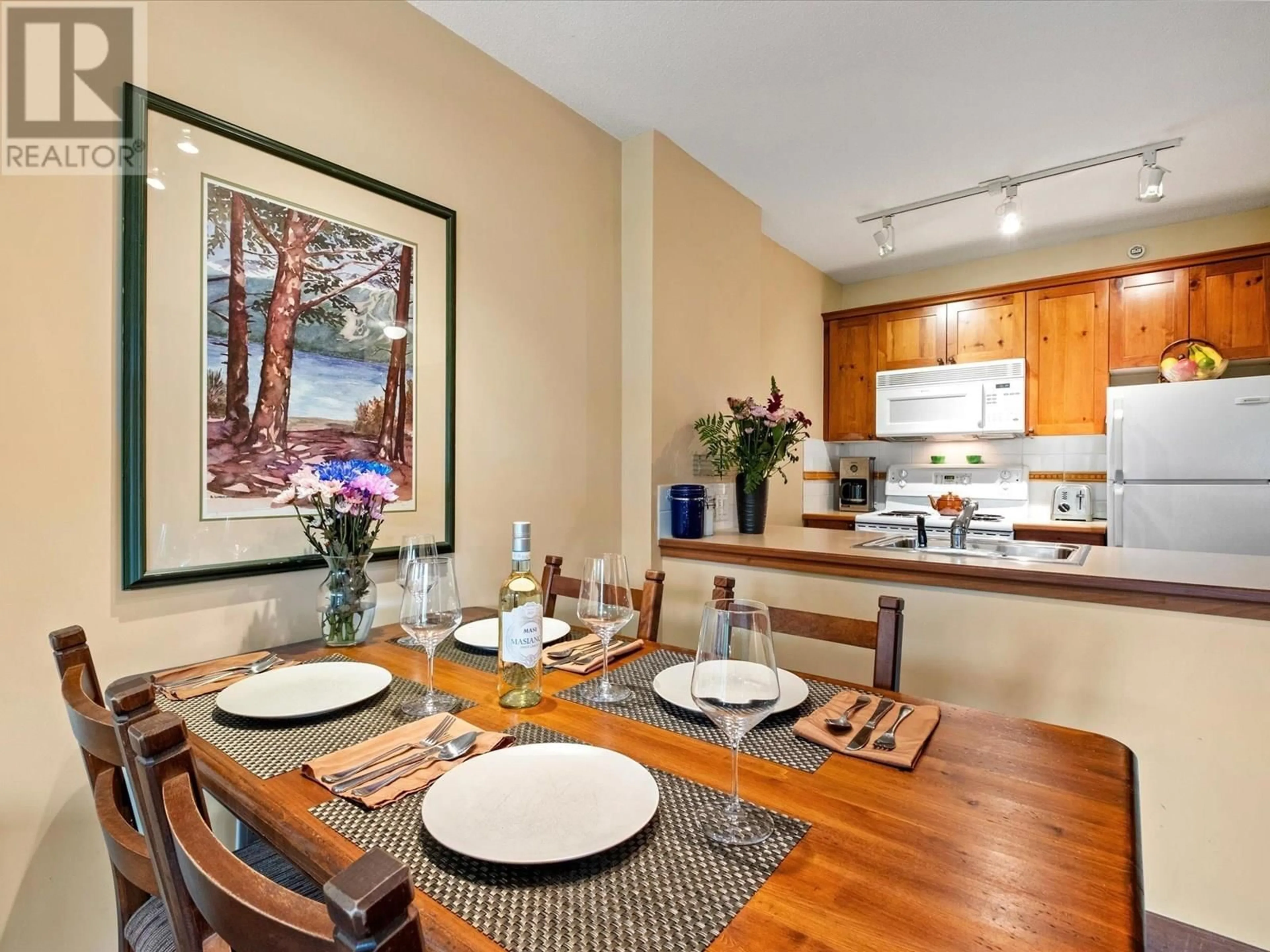 Dining room, wood/laminate floor for 511 - 4660 BLACKCOMB WAY, Whistler British Columbia V0N1B4