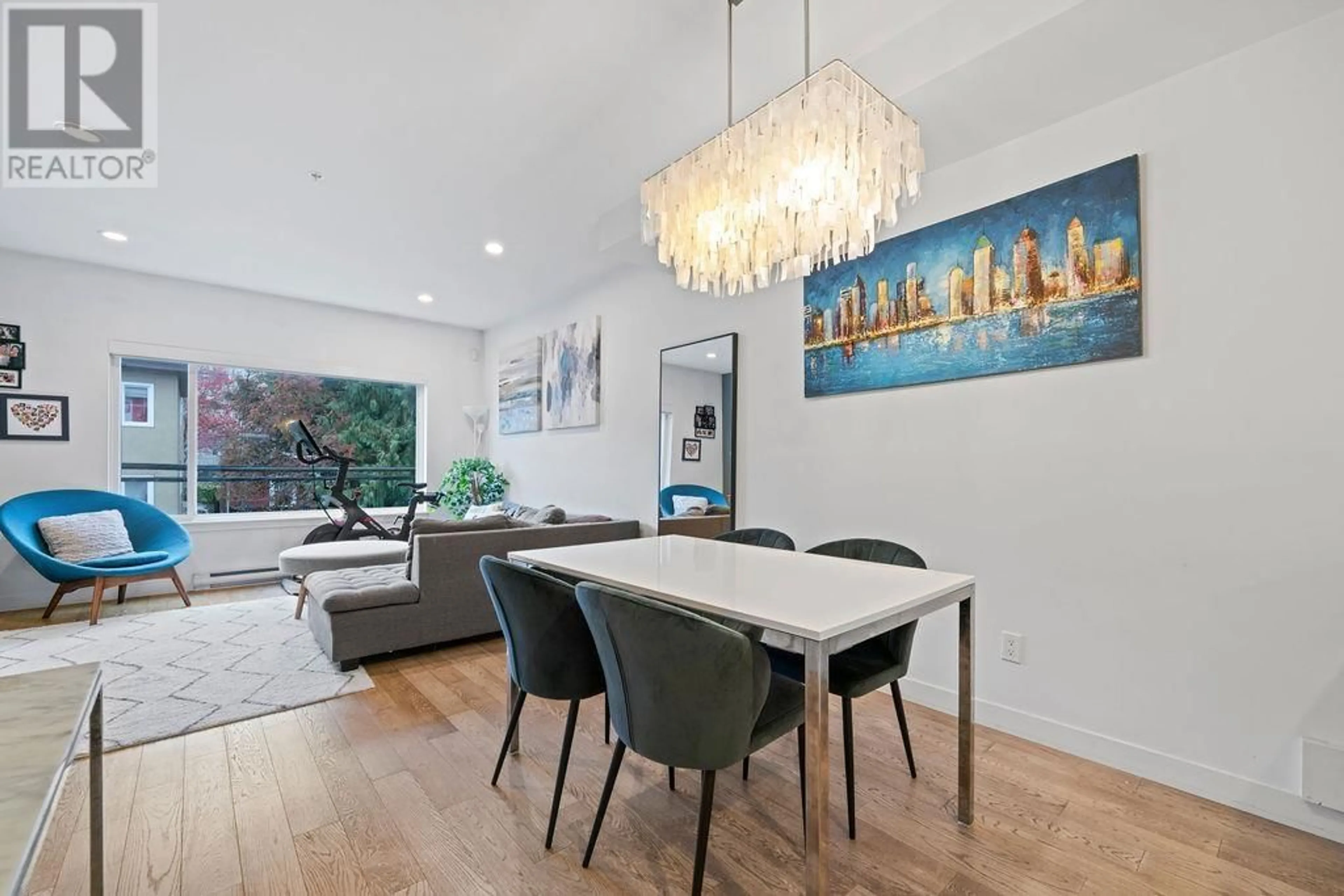Dining room, wood/laminate floor for 216 - 455 16TH AVENUE, Vancouver British Columbia V5T2T8