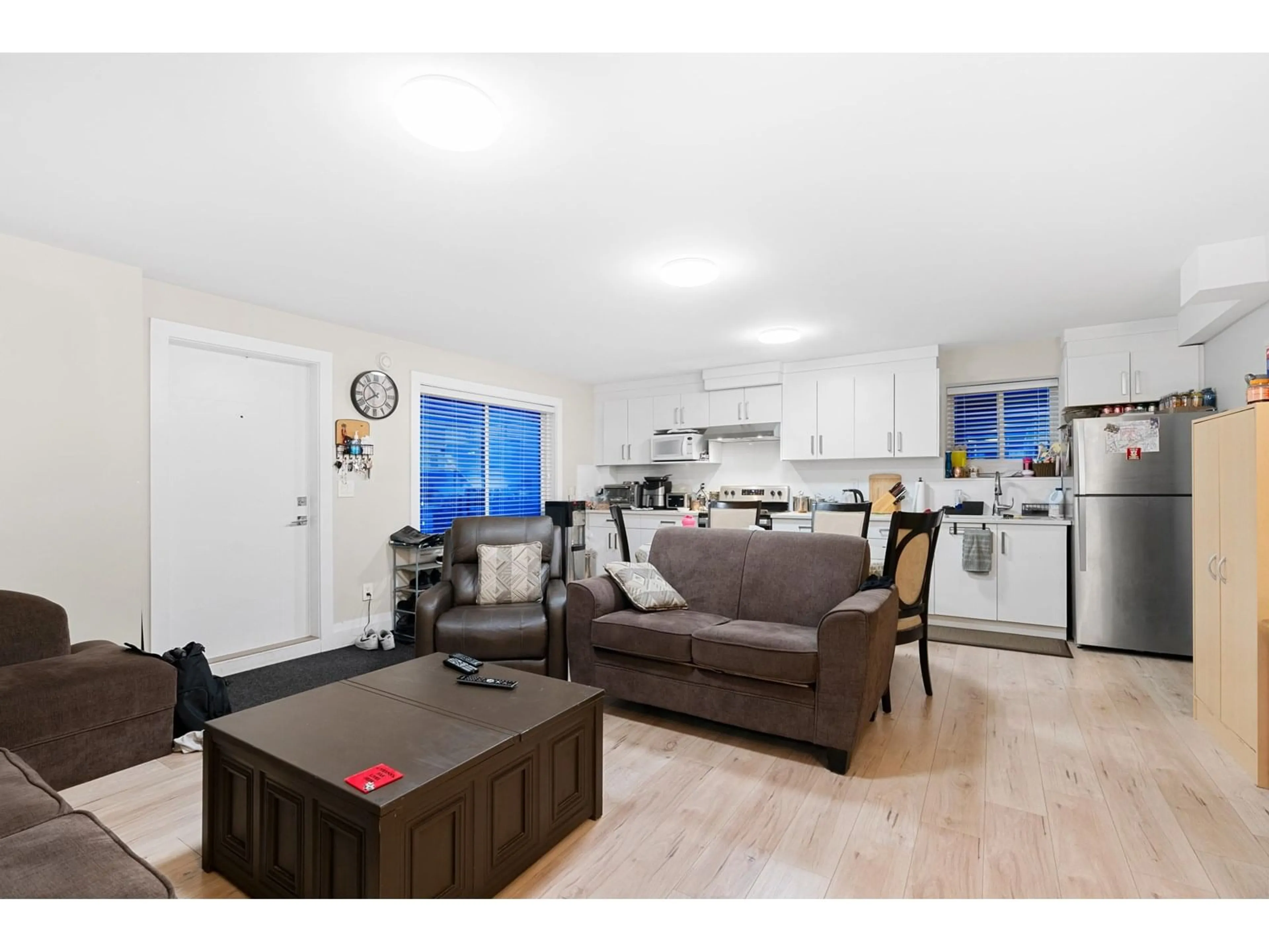 Open concept kitchen, wood/laminate floor for 11586 84B, Delta British Columbia V4C2T6