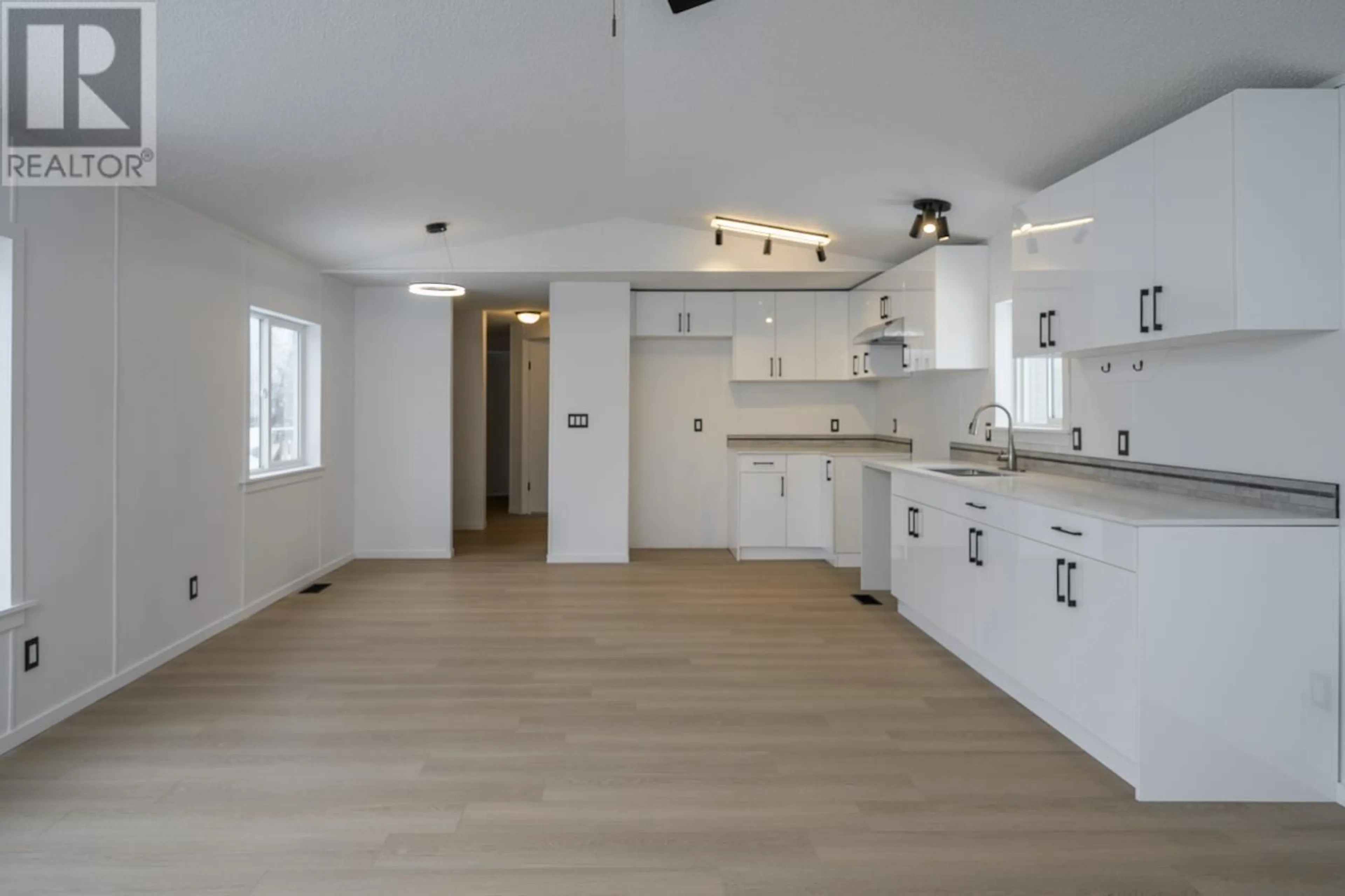 Open concept kitchen, wood/laminate floor for 56 - 8474 BUNCE ROAD, Prince George British Columbia V2N6Y8
