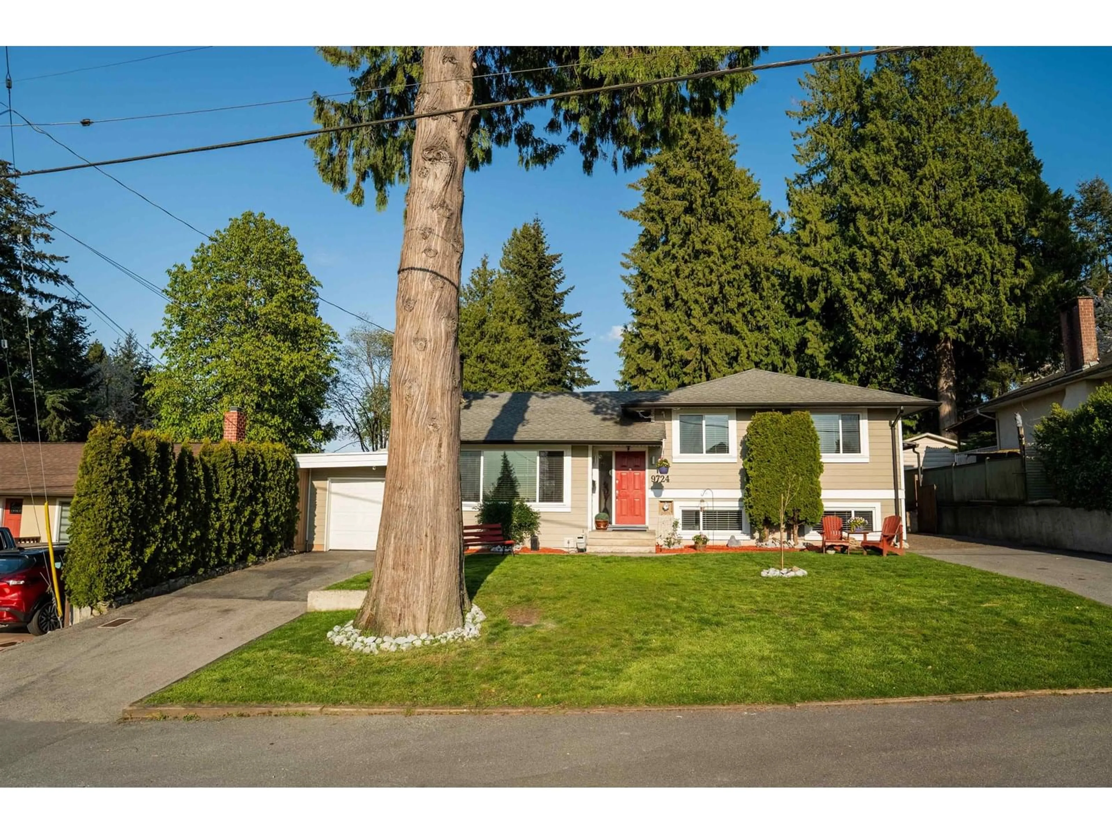 Home with vinyl exterior material, street for 9724 115A, Surrey British Columbia V3V3Z1