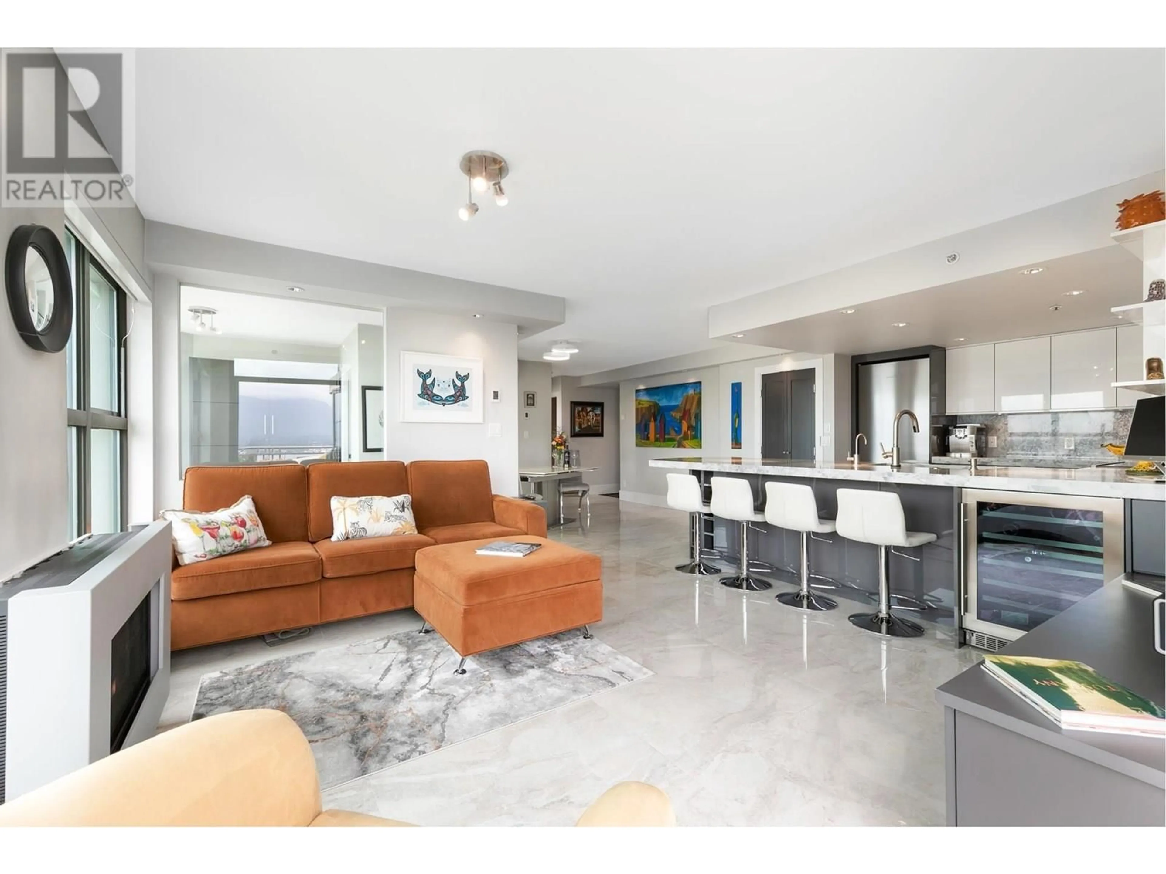 Living room with furniture, ceramic/tile floor for 2402 - 1128 QUEBEC STREET, Vancouver British Columbia V6A4E1