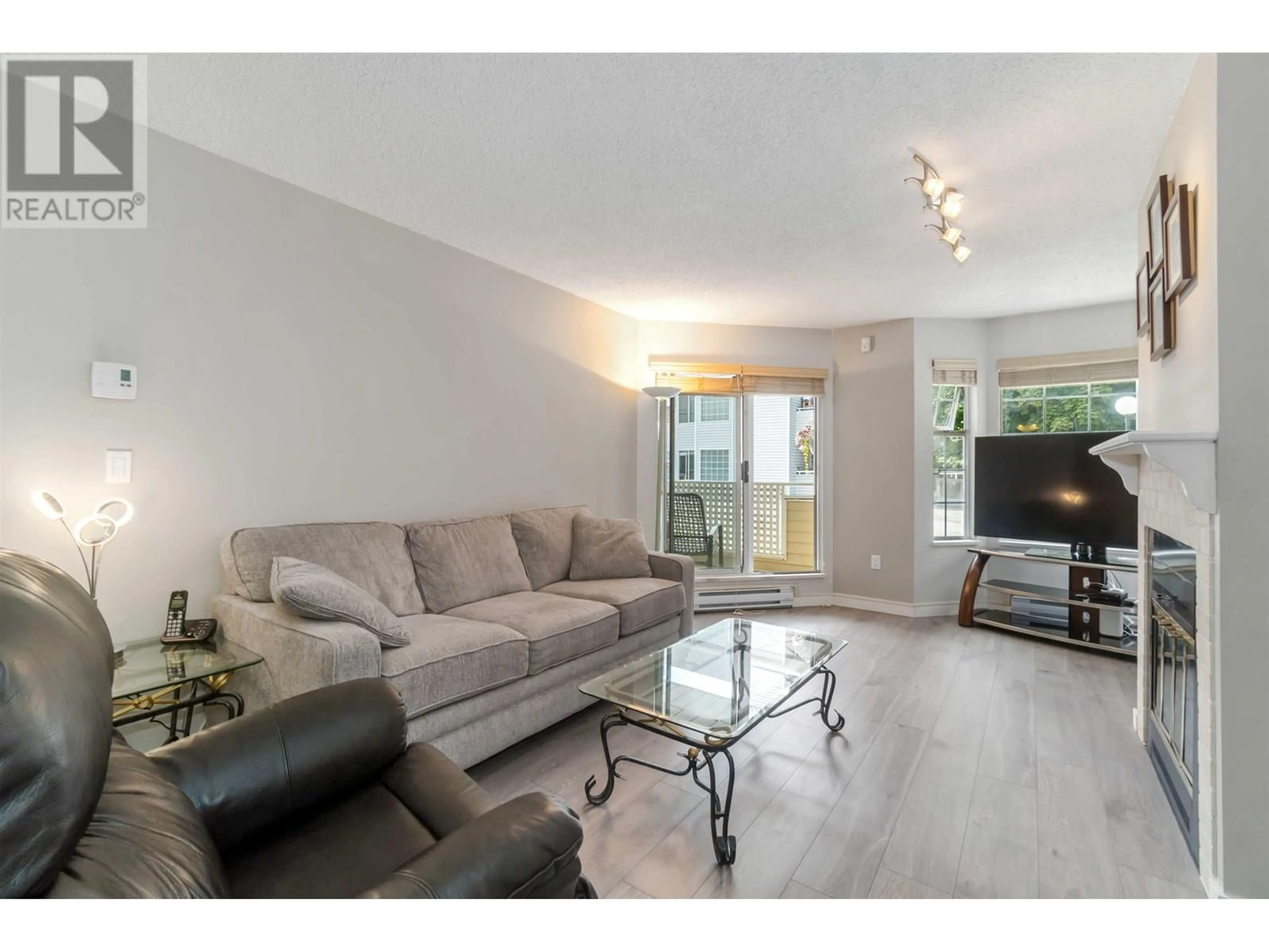 Living room with furniture, unknown for 104 - 7571 MOFFATT ROAD, Richmond British Columbia V6Y3N1