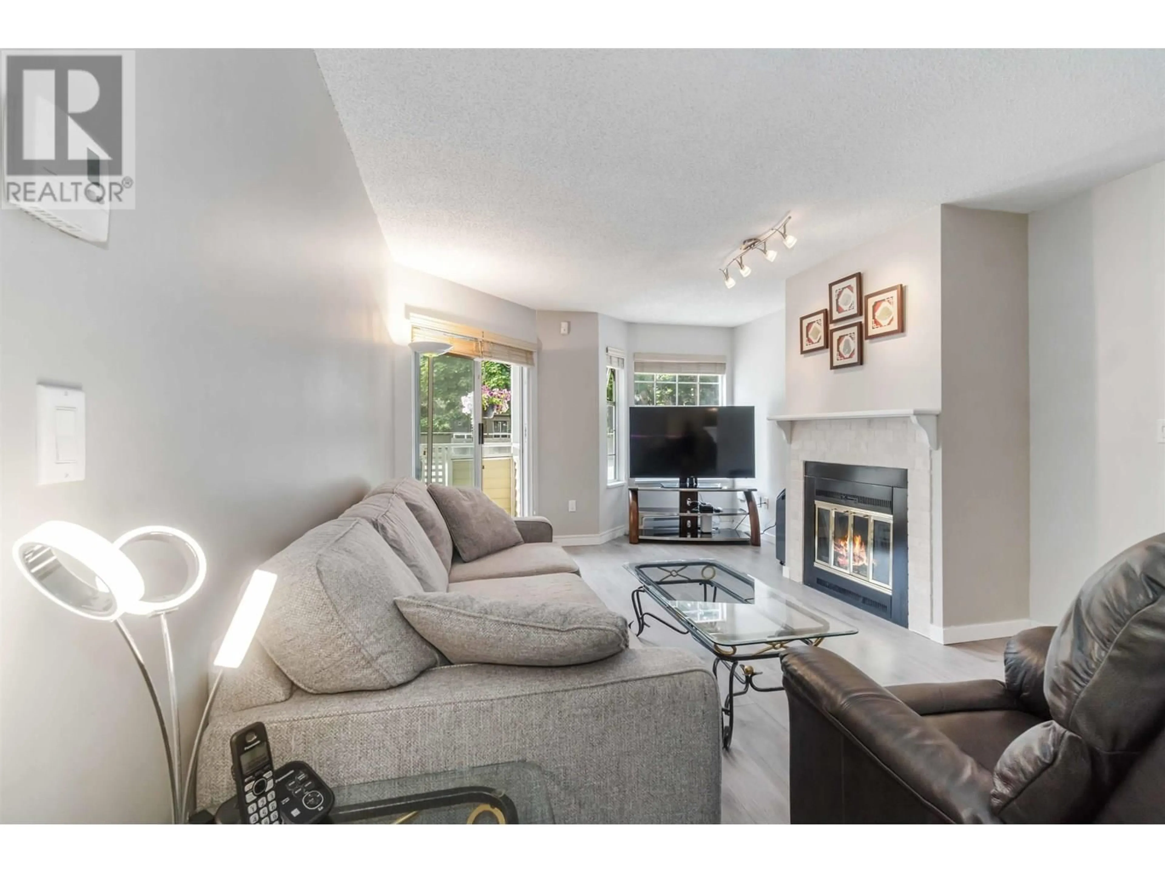 Living room with furniture, unknown for 104 - 7571 MOFFATT ROAD, Richmond British Columbia V6Y3N1