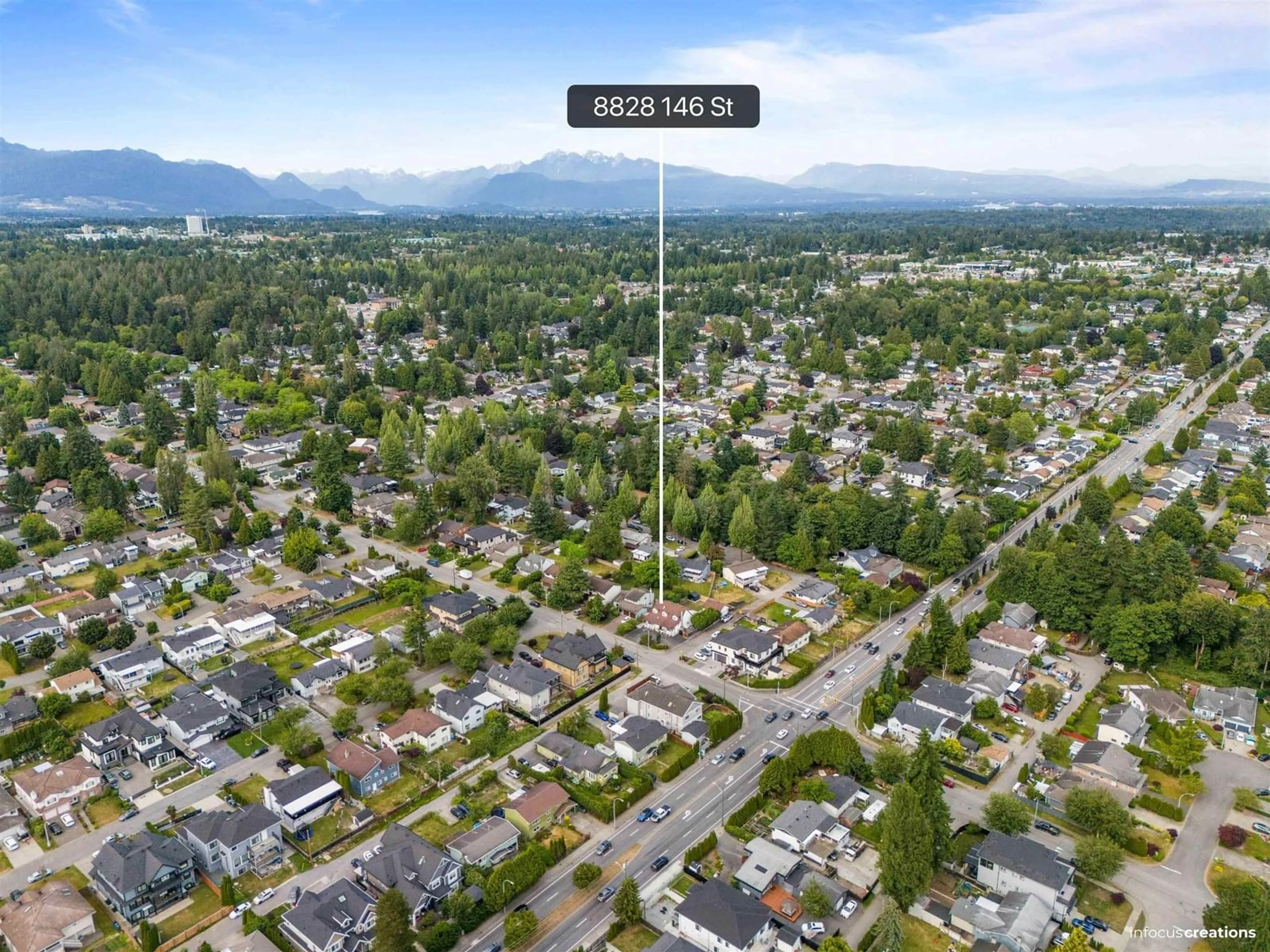 A pic from outside/outdoor area/front of a property/back of a property/a pic from drone, mountain view for 8828 146, Surrey British Columbia V3R6R2