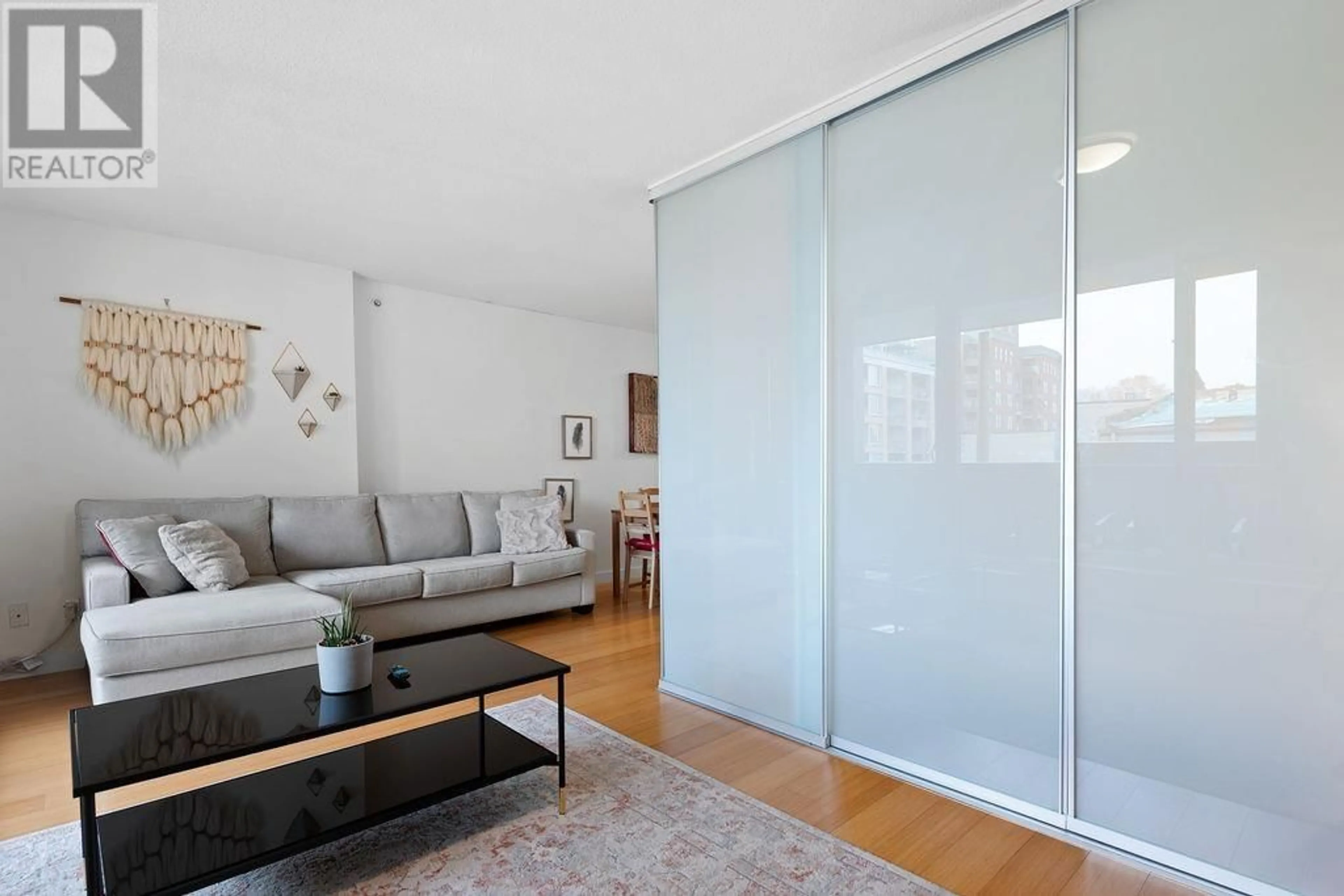 Living room with furniture, unknown for 406 - 718 MAIN STREET, Vancouver British Columbia V6A0B1