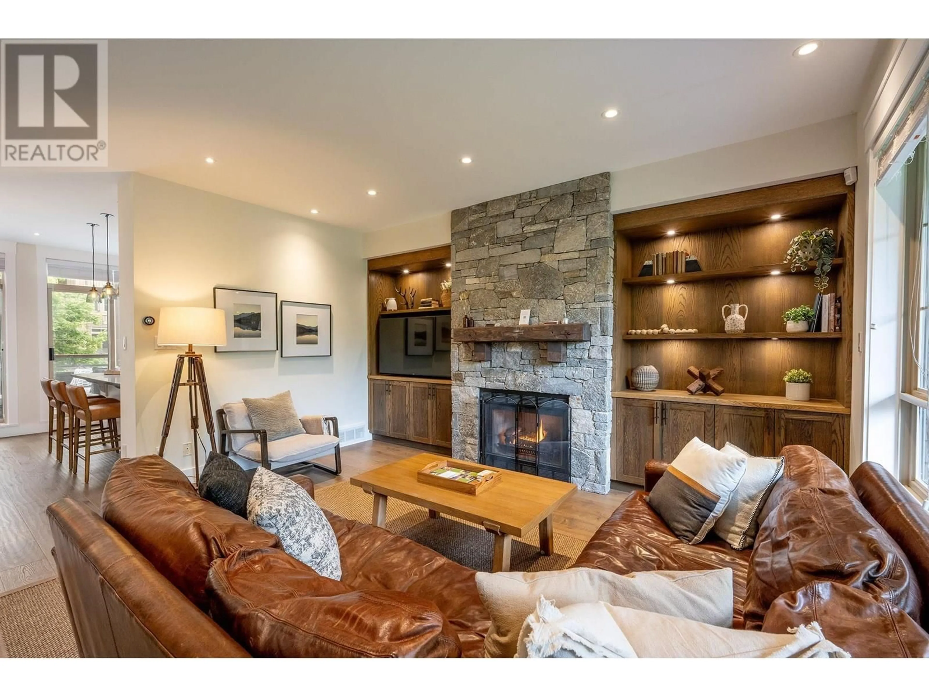 Living room with furniture, wood/laminate floor for 17 - 8030 NICKLAUS NORTH BOULEVARD, Whistler British Columbia V8E1J7