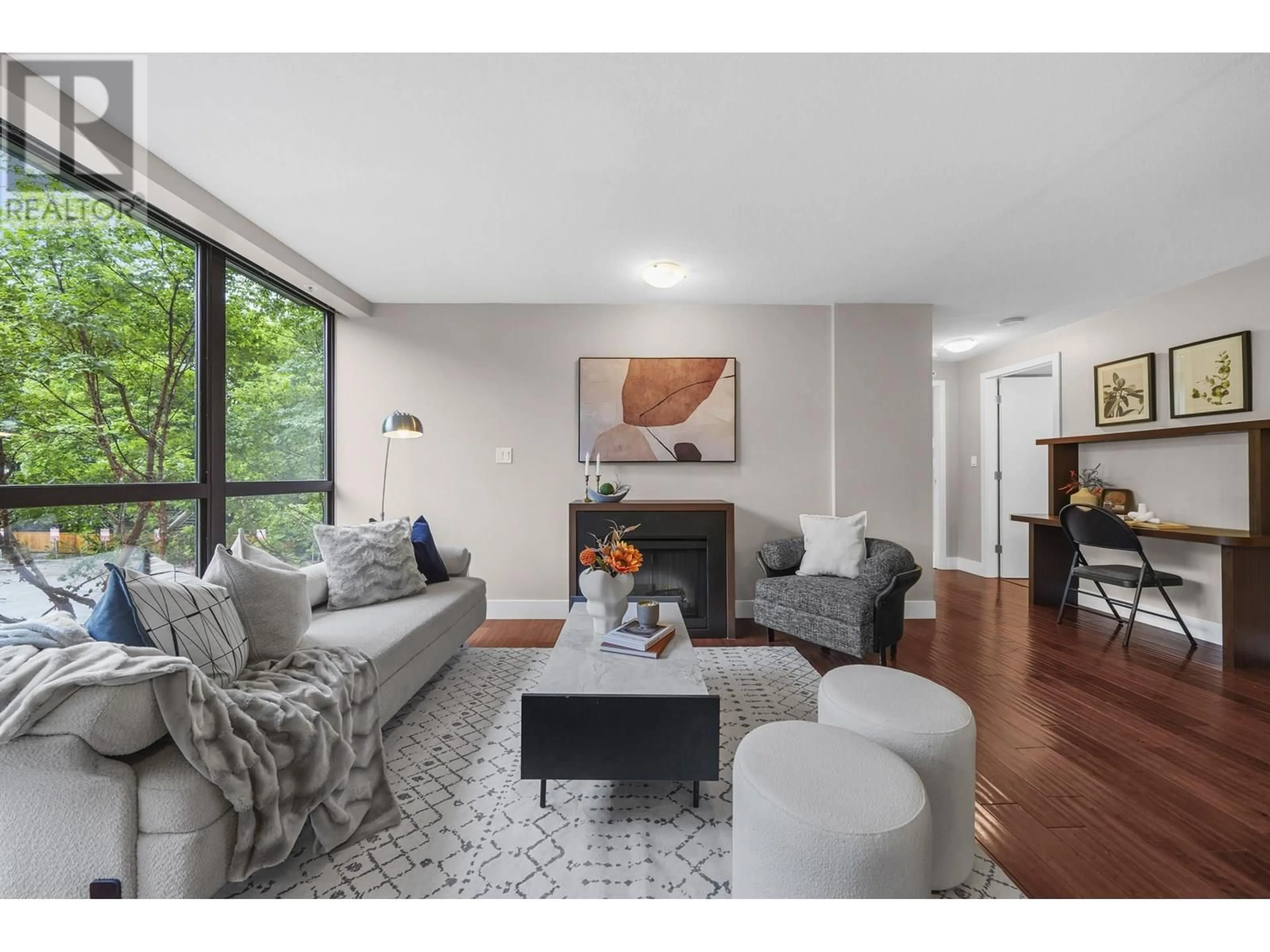 Living room with furniture, unknown for 202 - 2959 GLEN DRIVE, Coquitlam British Columbia V3B0B8