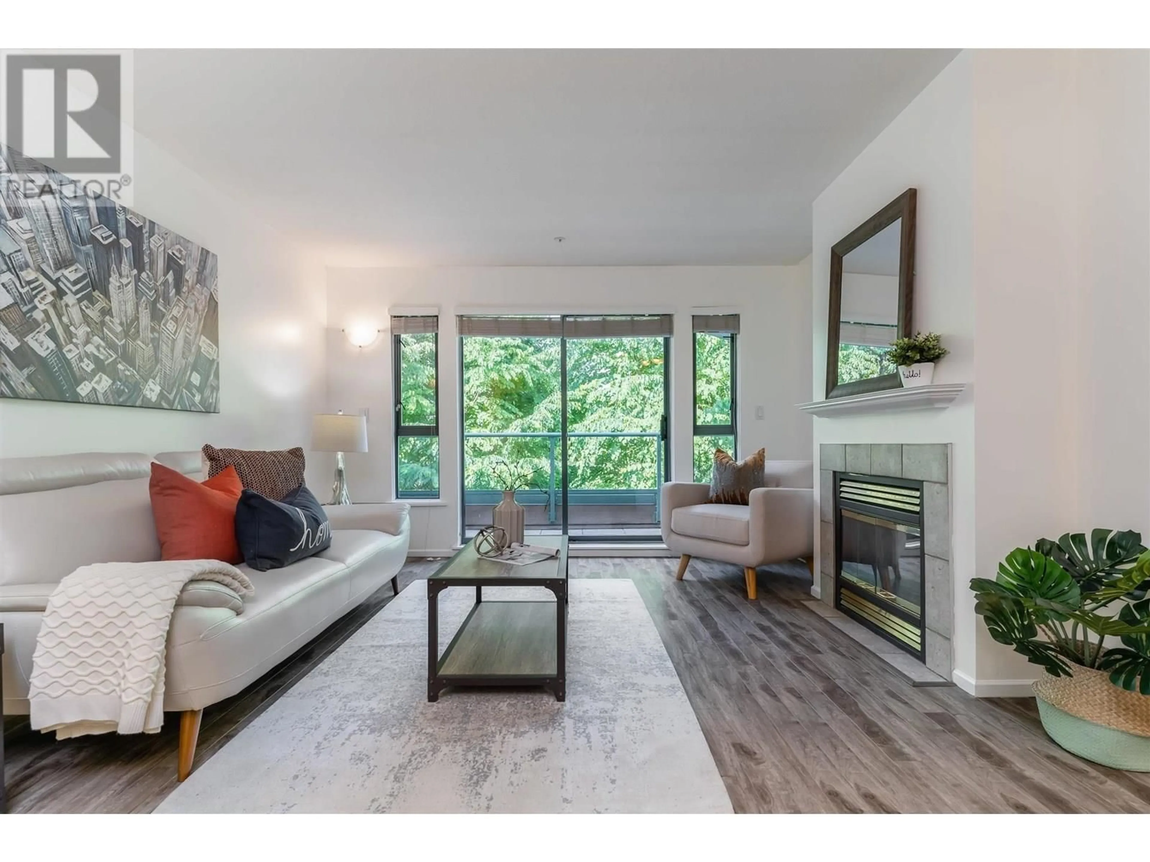 Living room with furniture, wood/laminate floor for PH12 - 223 MOUNTAIN HIGHWAY, North Vancouver British Columbia V7J3V3