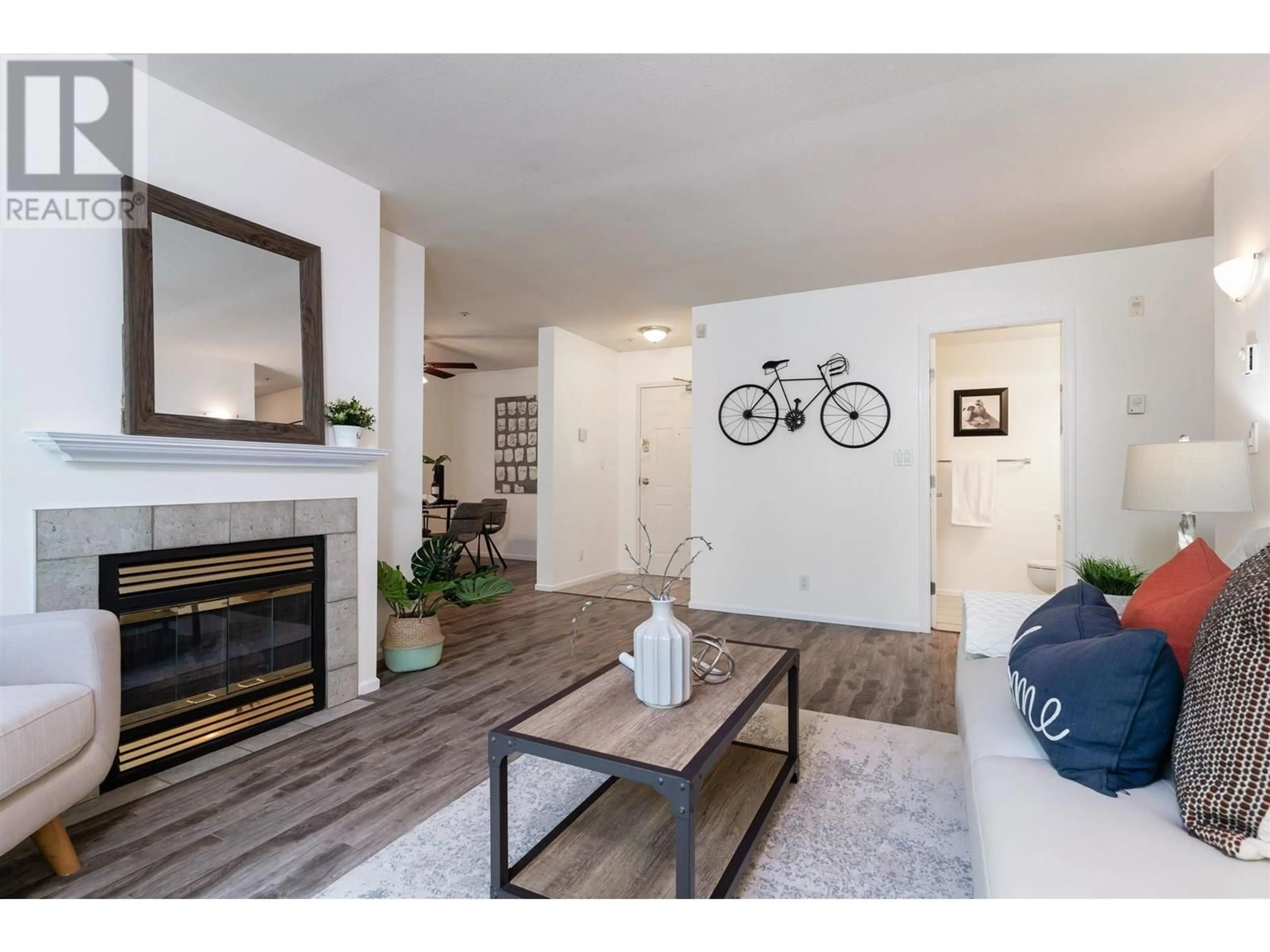 Living room with furniture, wood/laminate floor for PH12 - 223 MOUNTAIN HIGHWAY, North Vancouver British Columbia V7J3V3