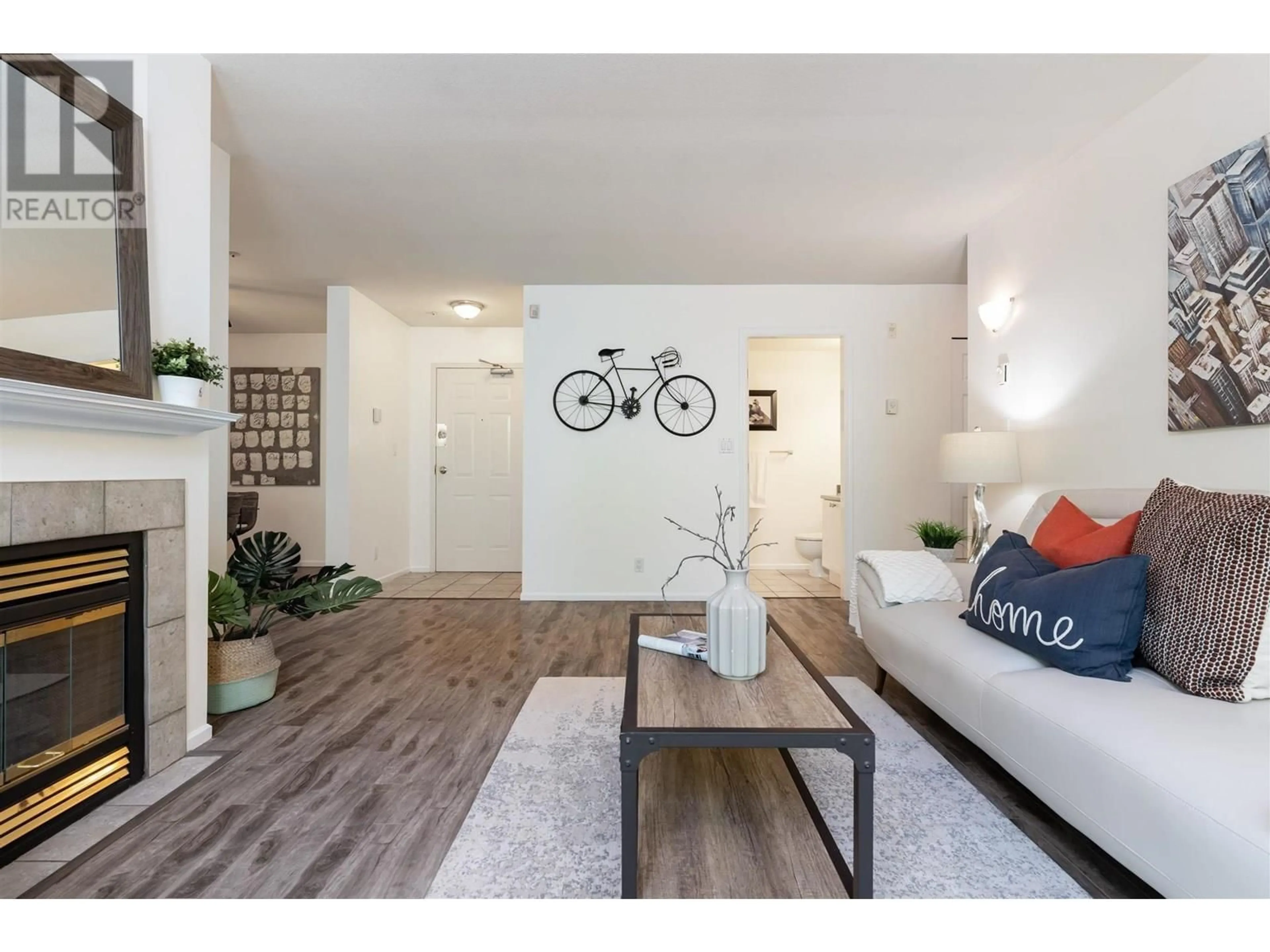 Living room with furniture, wood/laminate floor for PH12 - 223 MOUNTAIN HIGHWAY, North Vancouver British Columbia V7J3V3