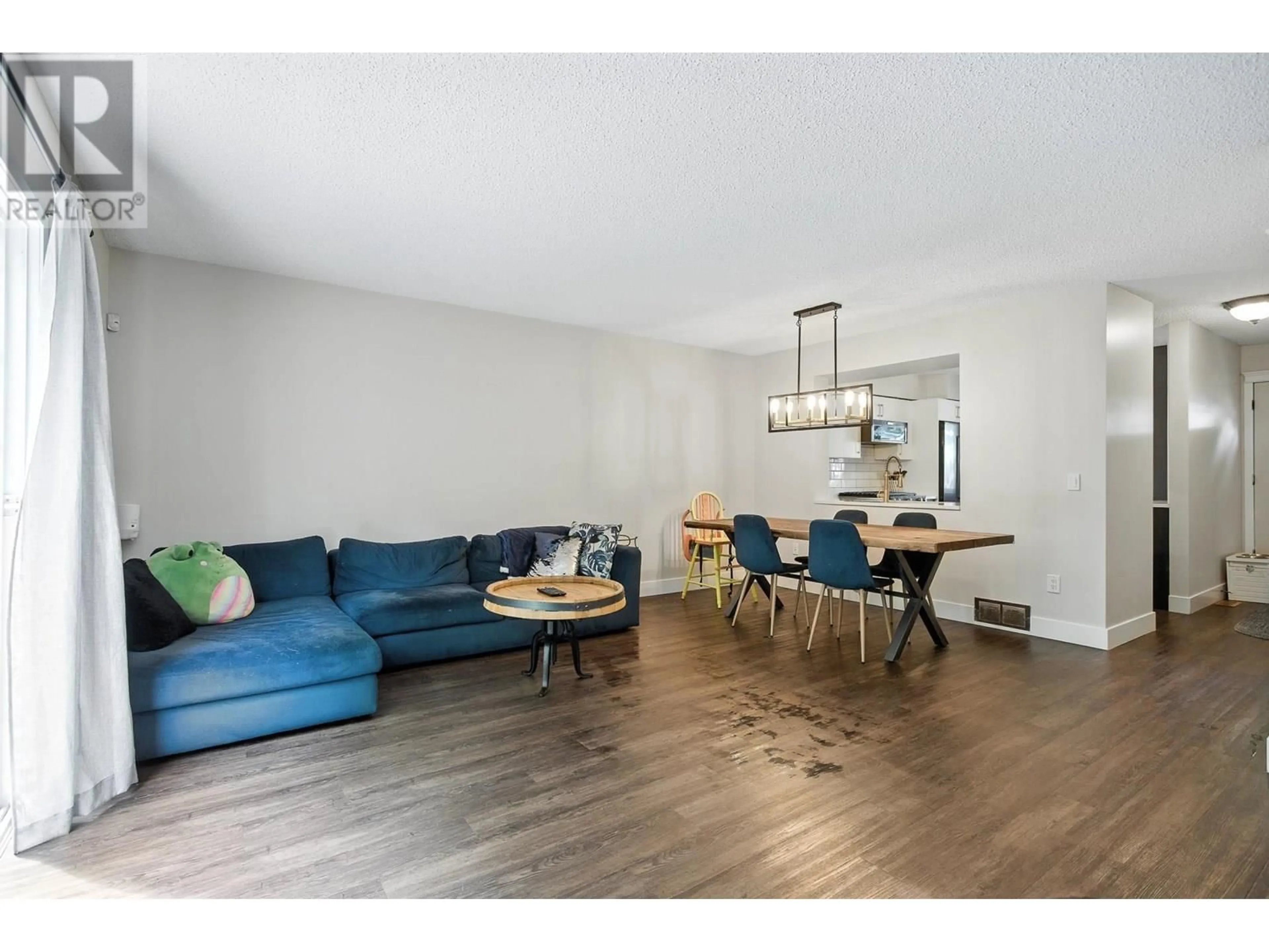 Living room with furniture, wood/laminate floor for 317 B EVERGREEN DRIVE, Port Moody British Columbia V3H1S1