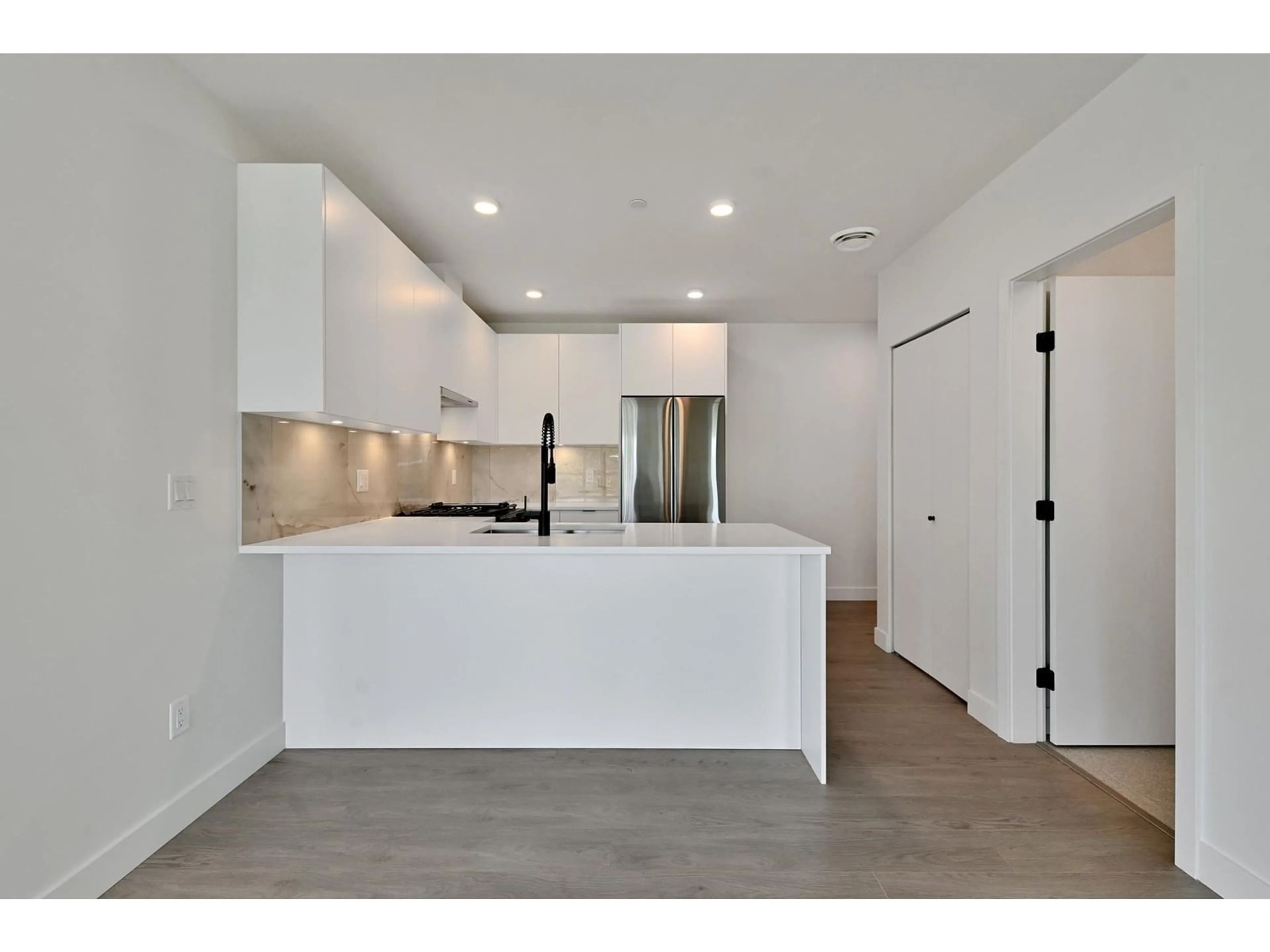 Open concept kitchen, unknown for 308 - 13238 105, Surrey British Columbia V3T0W1