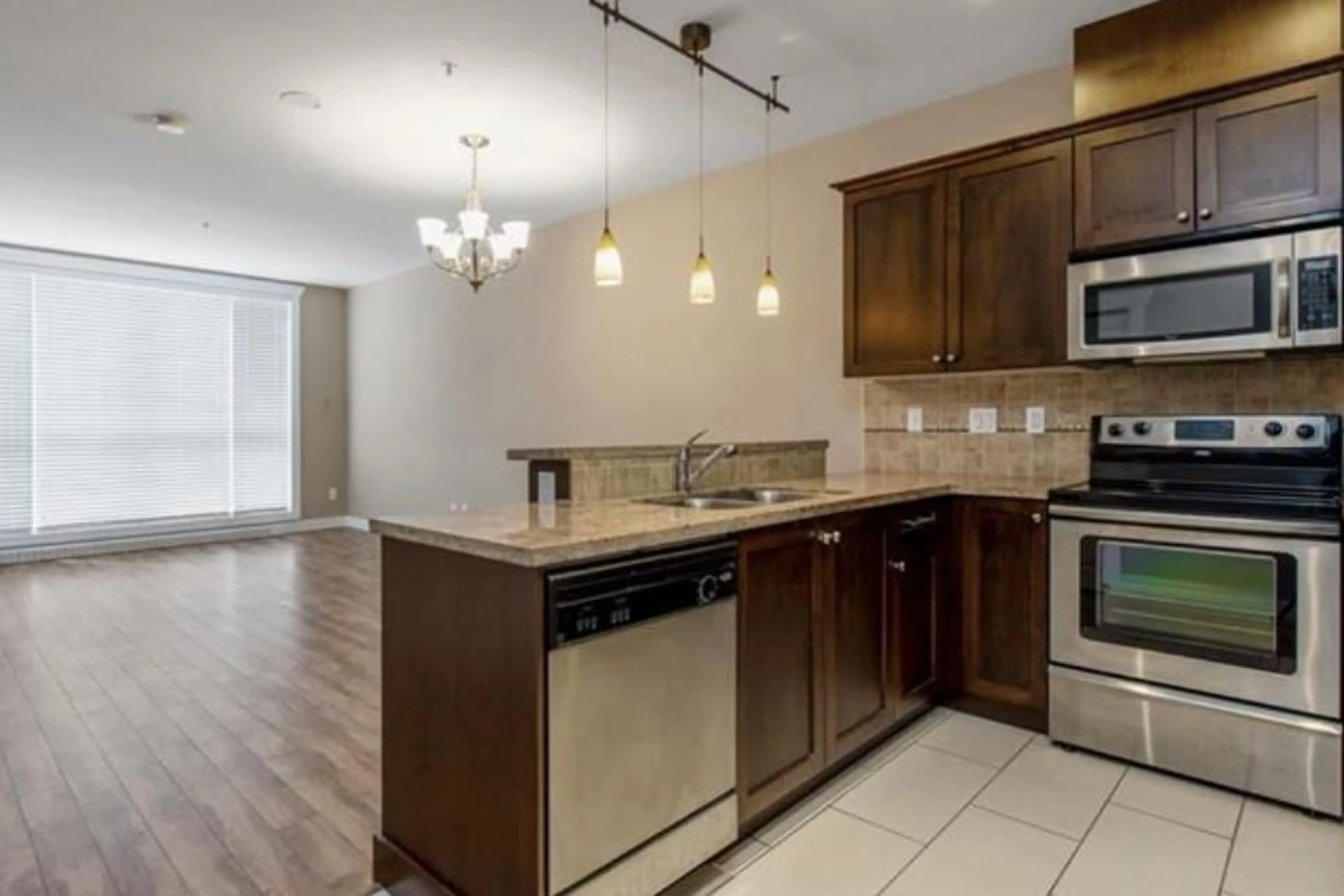 Open concept kitchen, unknown for 603 - 14333 104, Surrey British Columbia V3T0E1