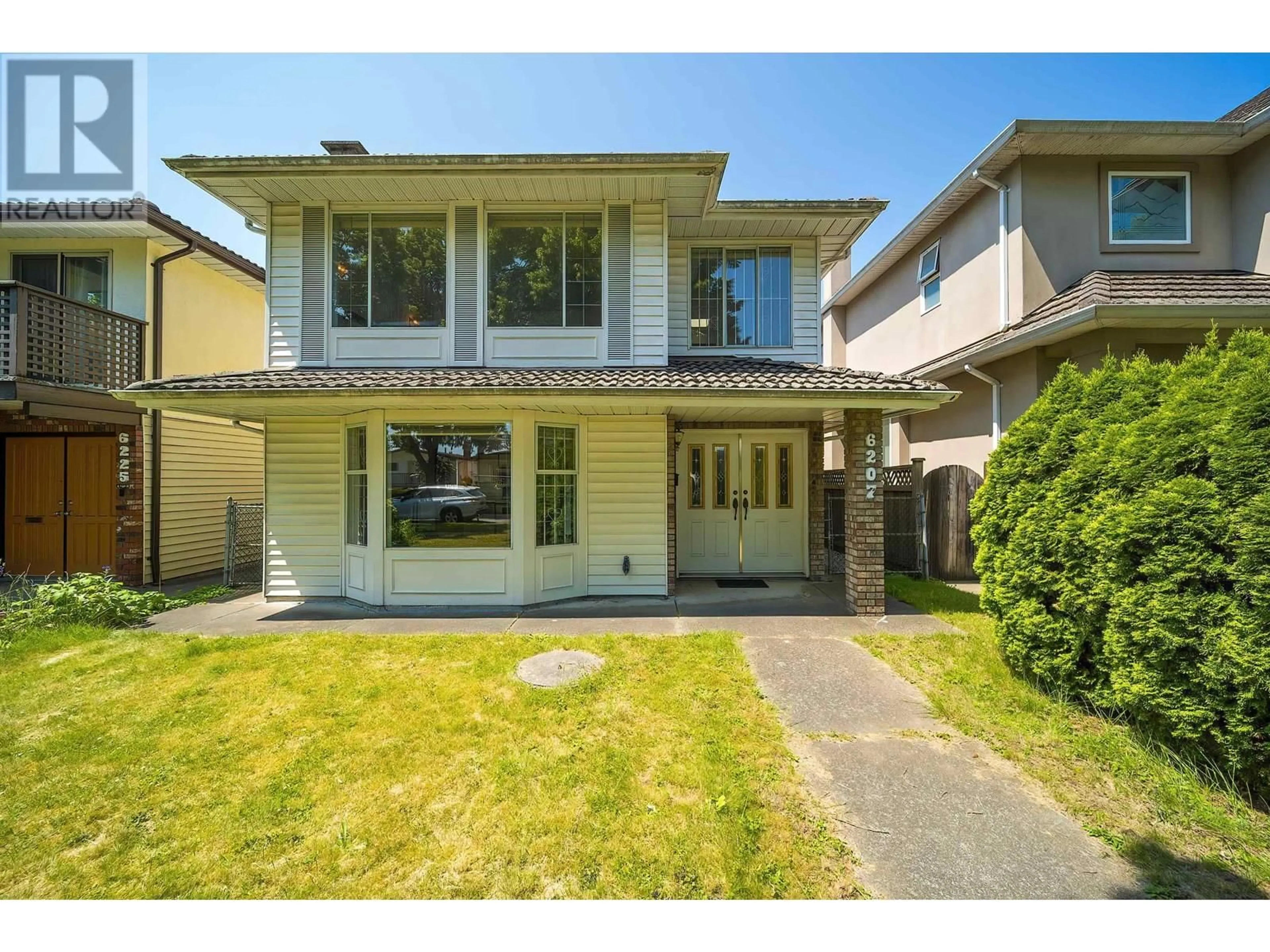 Home with vinyl exterior material, street for 6207 WINDSOR STREET, Vancouver British Columbia V5W3J2