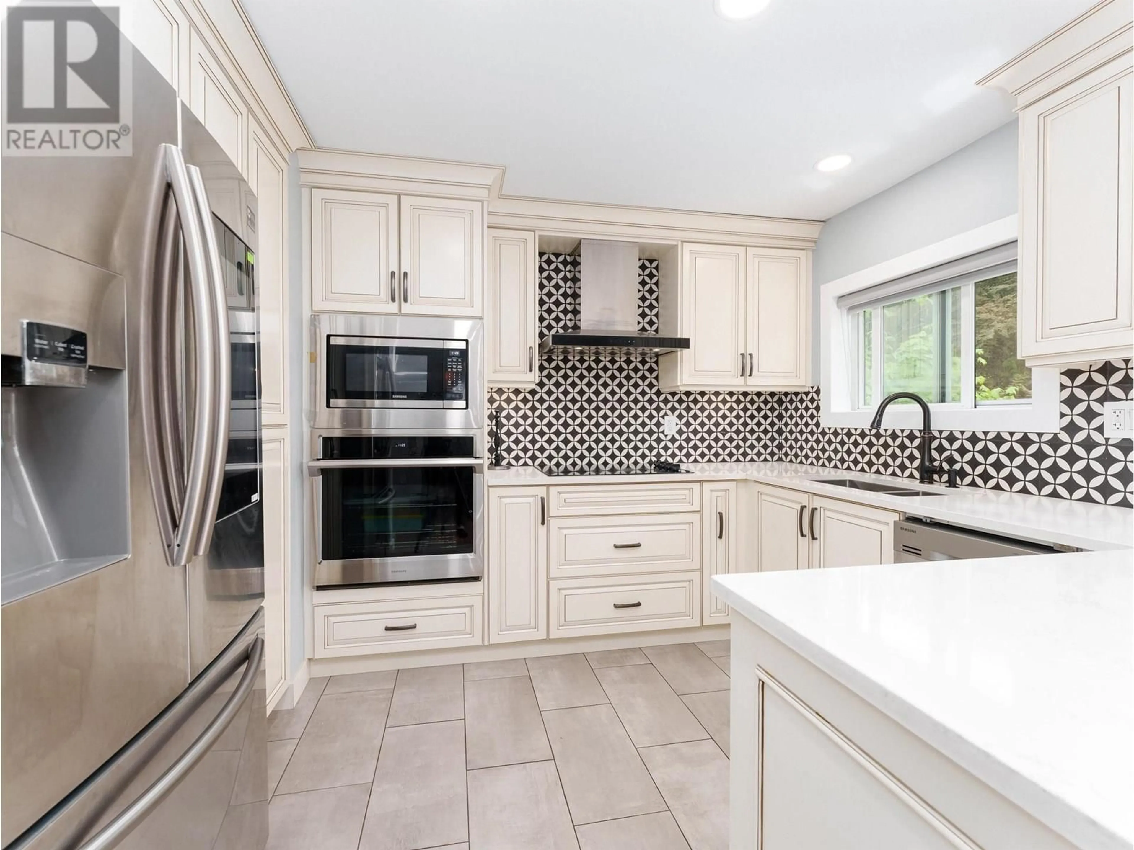 Contemporary kitchen, ceramic/tile floor for 8626 GILLEY AVENUE, Burnaby British Columbia V5J4Y5