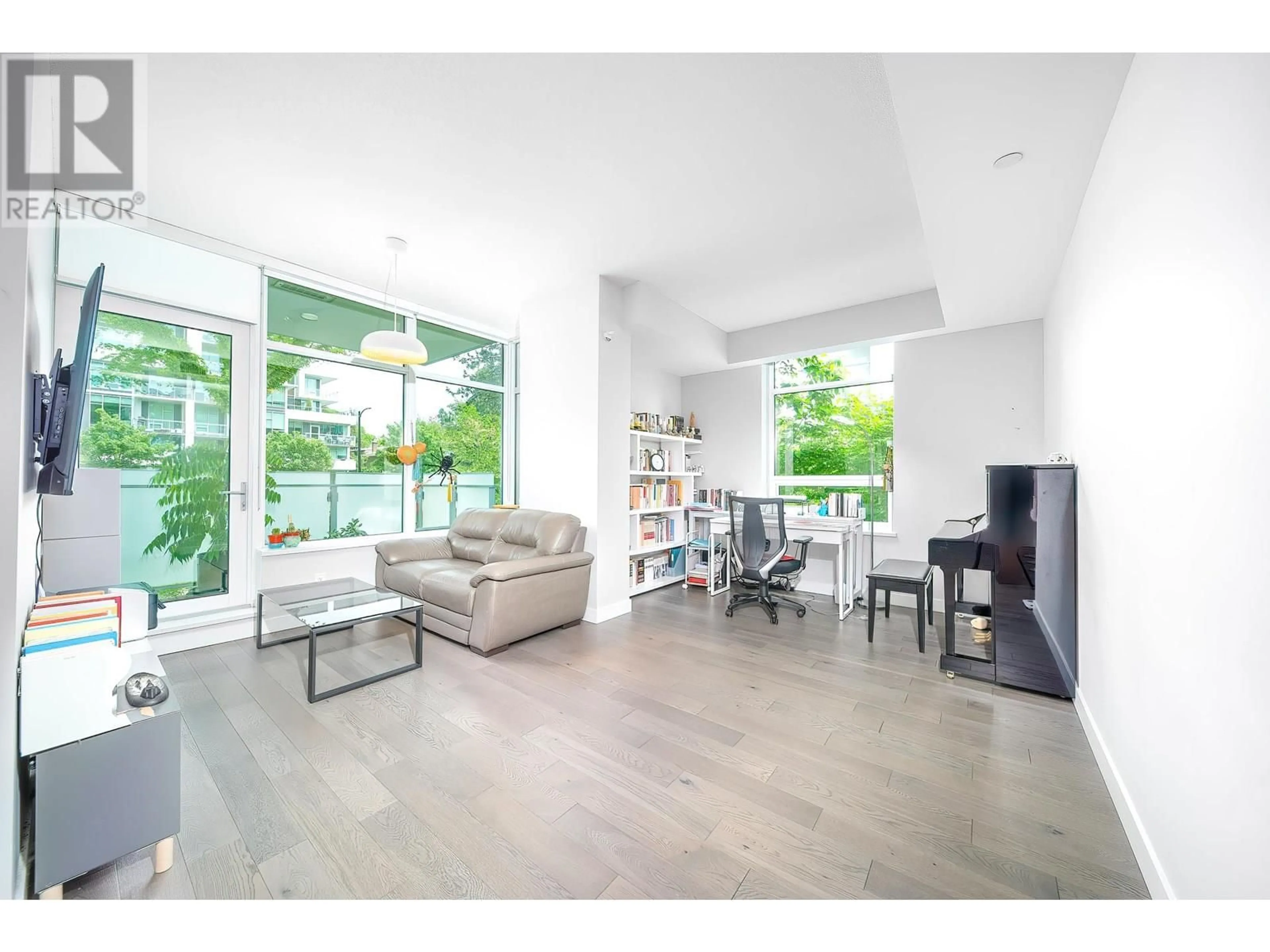 Living room with furniture, wood/laminate floor for 209 - 4963 CAMBIE STREET, Vancouver British Columbia V5Z2Z6