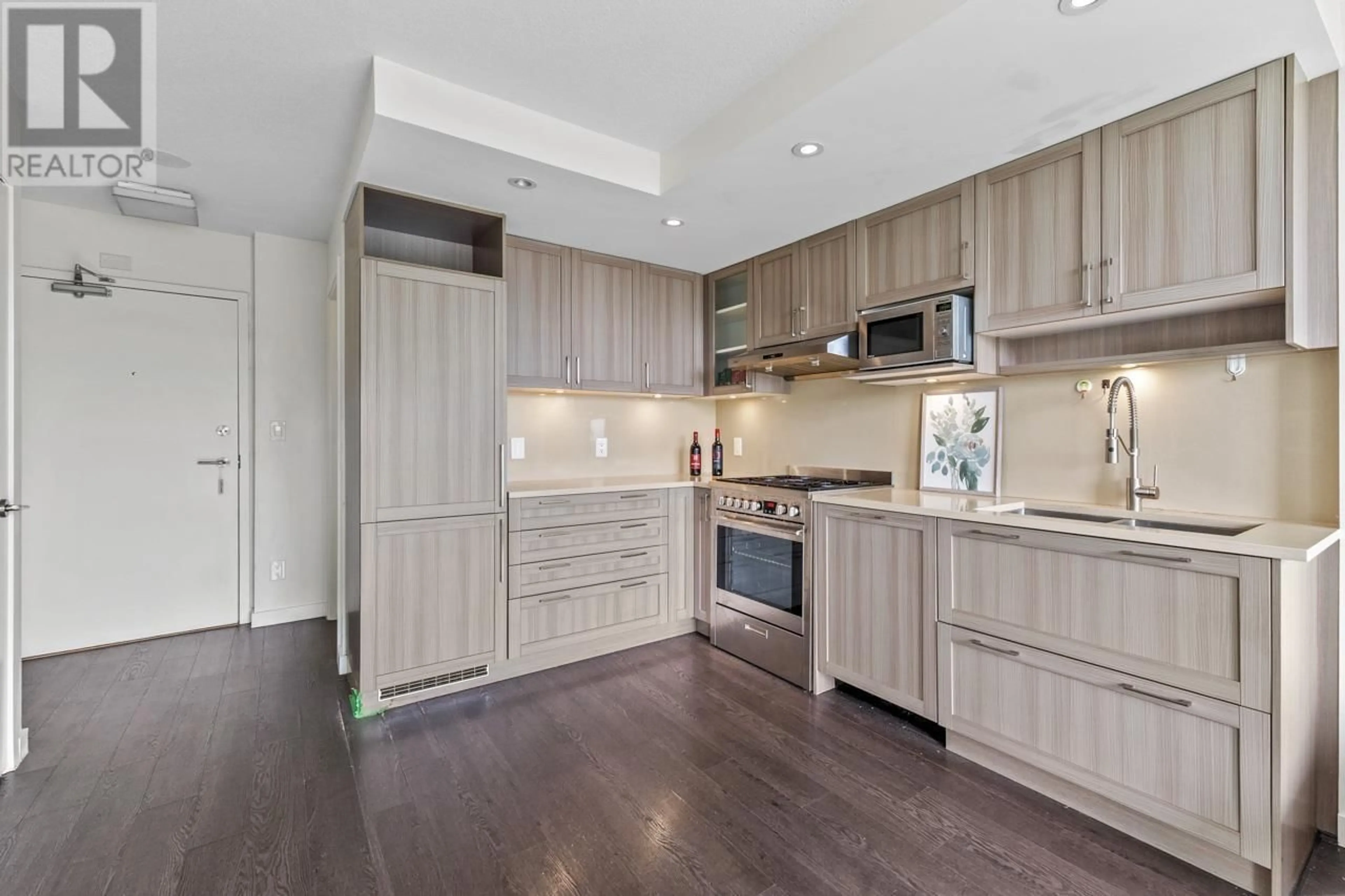 Open concept kitchen, wood/laminate floor for 807 - 5470 ORMIDALE STREET, Vancouver British Columbia V5R0G6
