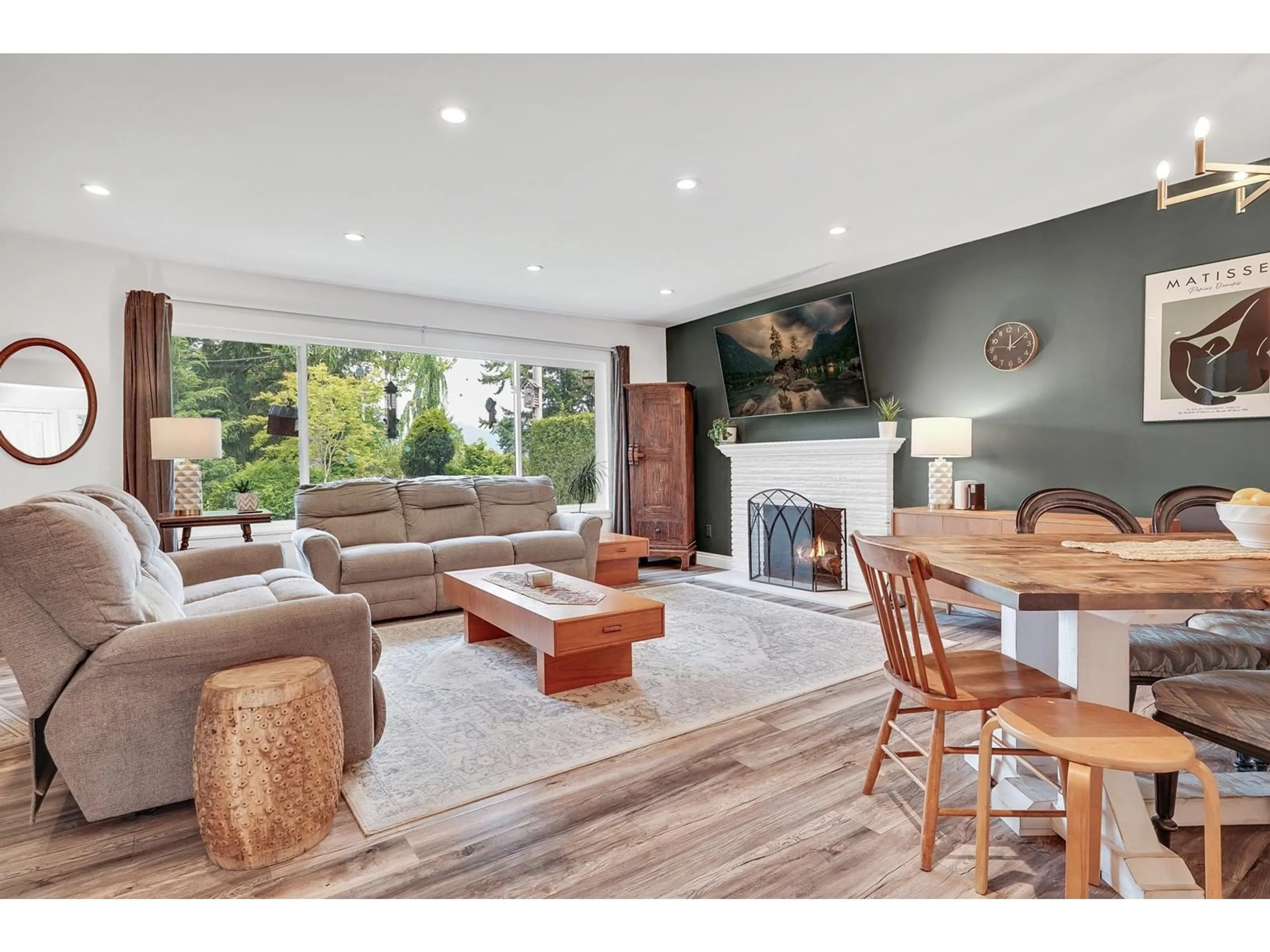 Living room with furniture, wood/laminate floor for 14750 110A, Surrey British Columbia V3R2B7