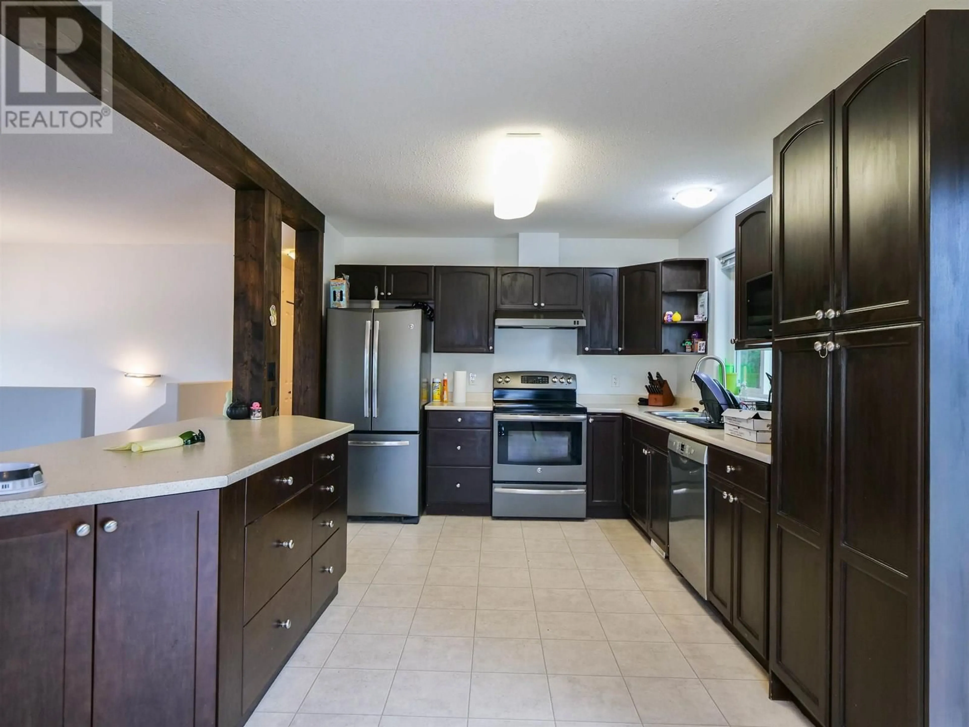 Open concept kitchen, ceramic/tile floor for 700 NADEAU STREET, Quesnel British Columbia V2J6P6