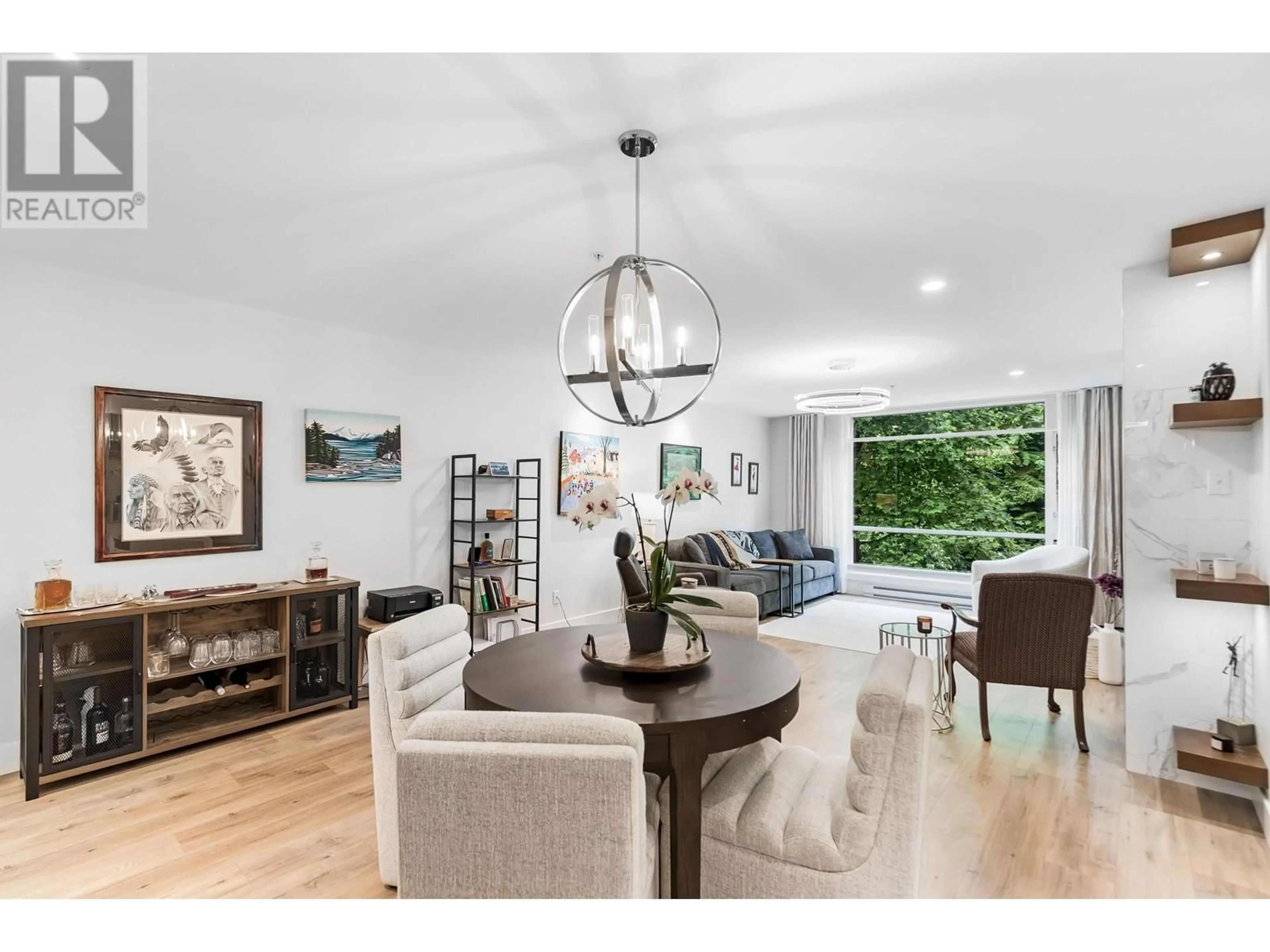 Open concept kitchen, wood/laminate floor for 210 - 19142 122 AVENUE, Pitt Meadows British Columbia V3Y2P9