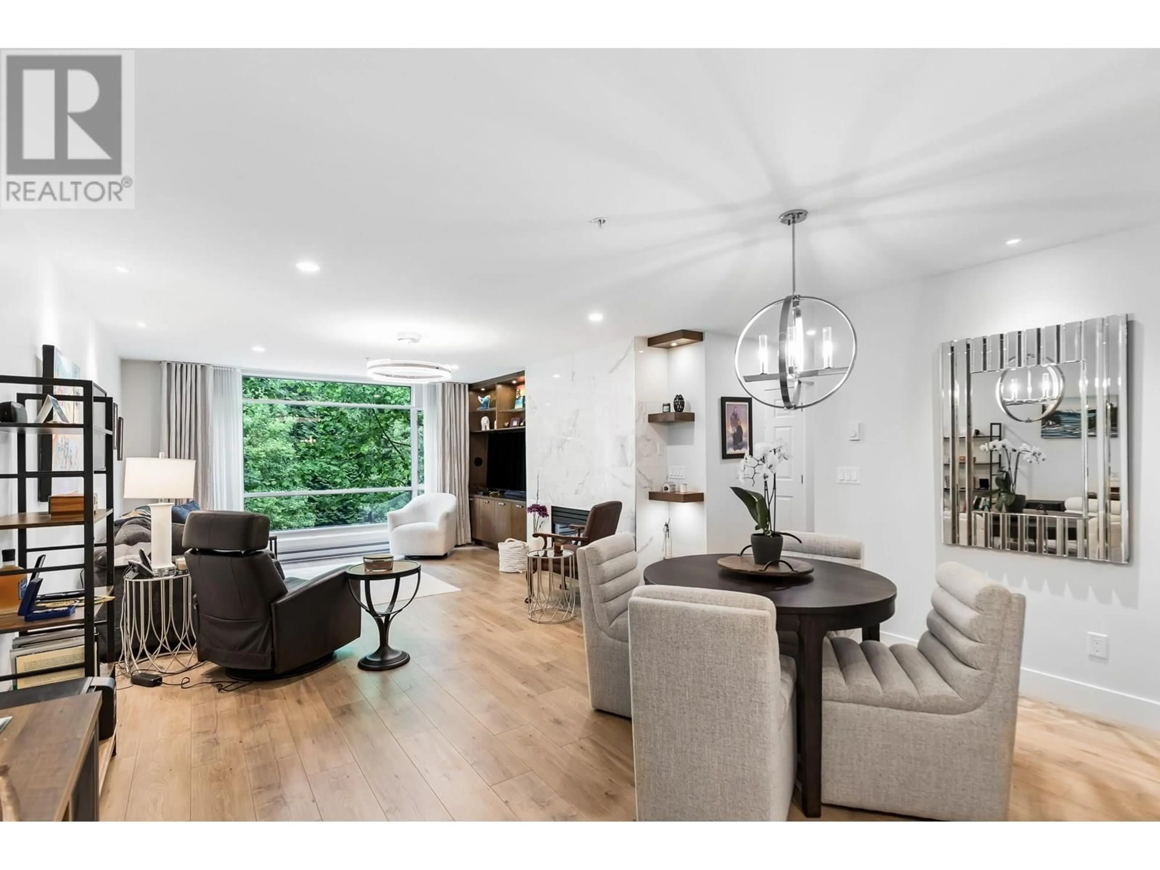 Living room with furniture, wood/laminate floor for 210 - 19142 122 AVENUE, Pitt Meadows British Columbia V3Y2P9