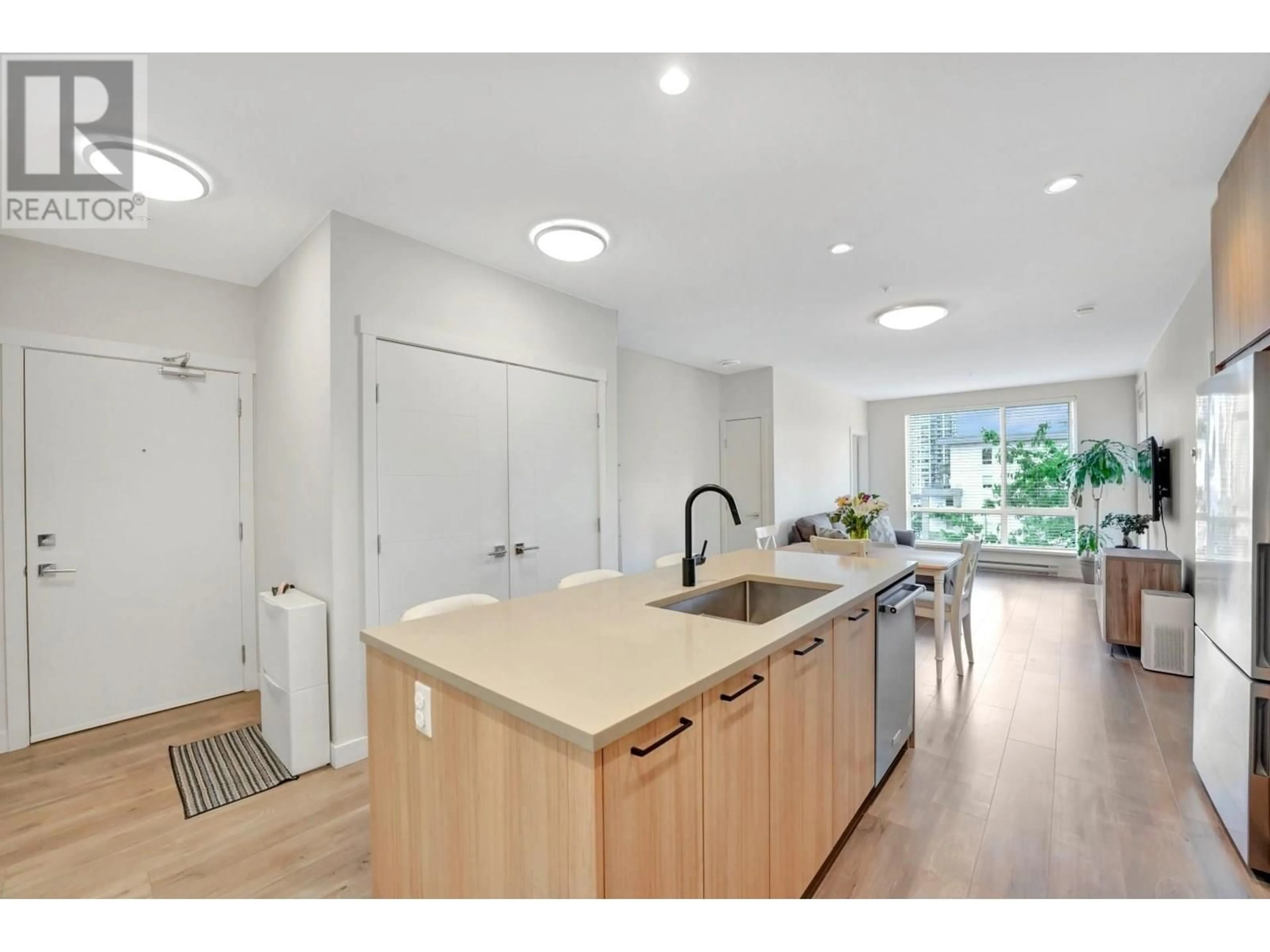 Open concept kitchen, unknown for 311 - 707 COMO LAKE AVENUE, Coquitlam British Columbia V3J0J5