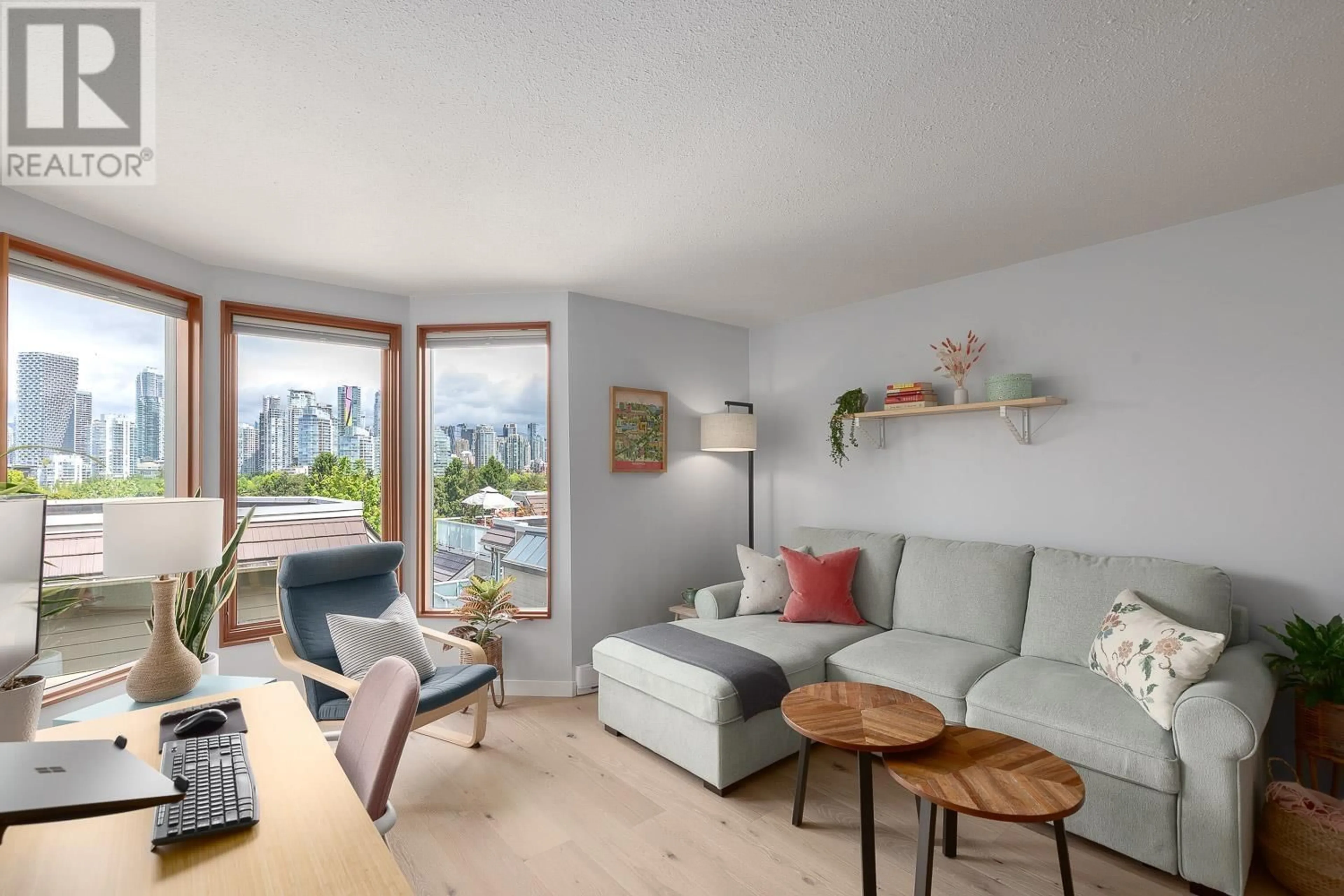 Living room with furniture, wood/laminate floor for 108 - 1141 7TH AVENUE, Vancouver British Columbia V6H1B5