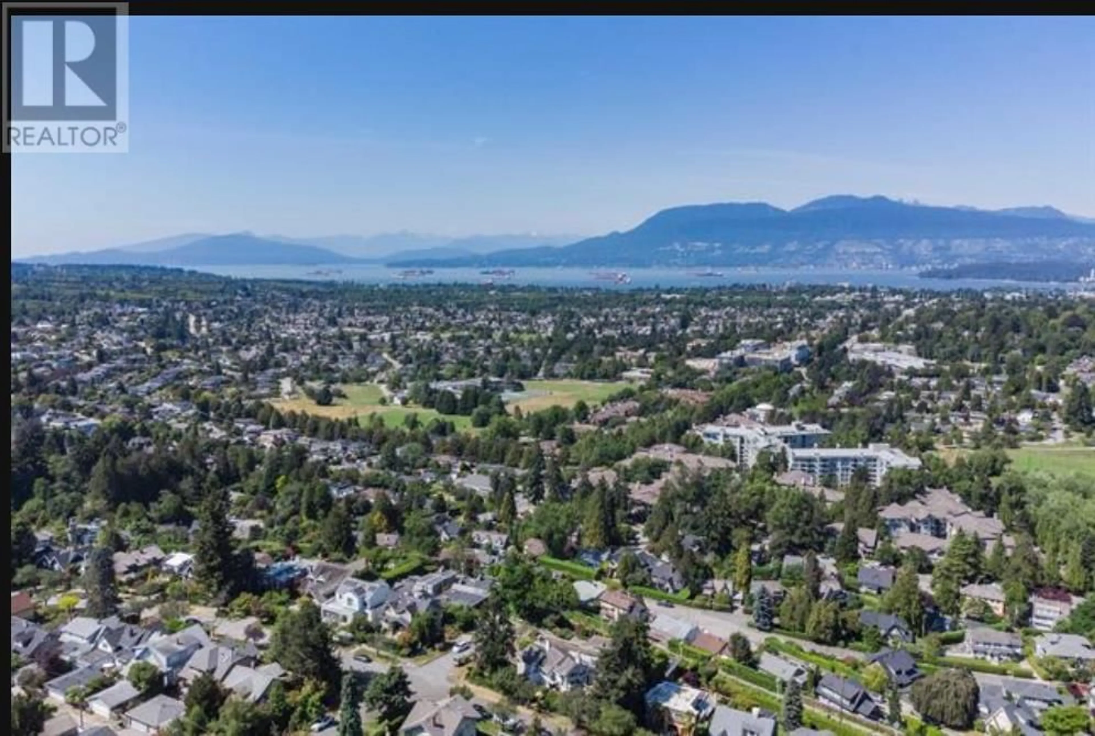 A pic from outside/outdoor area/front of a property/back of a property/a pic from drone, mountain view for 1997 35 AVENUE, Vancouver British Columbia V6M1H8