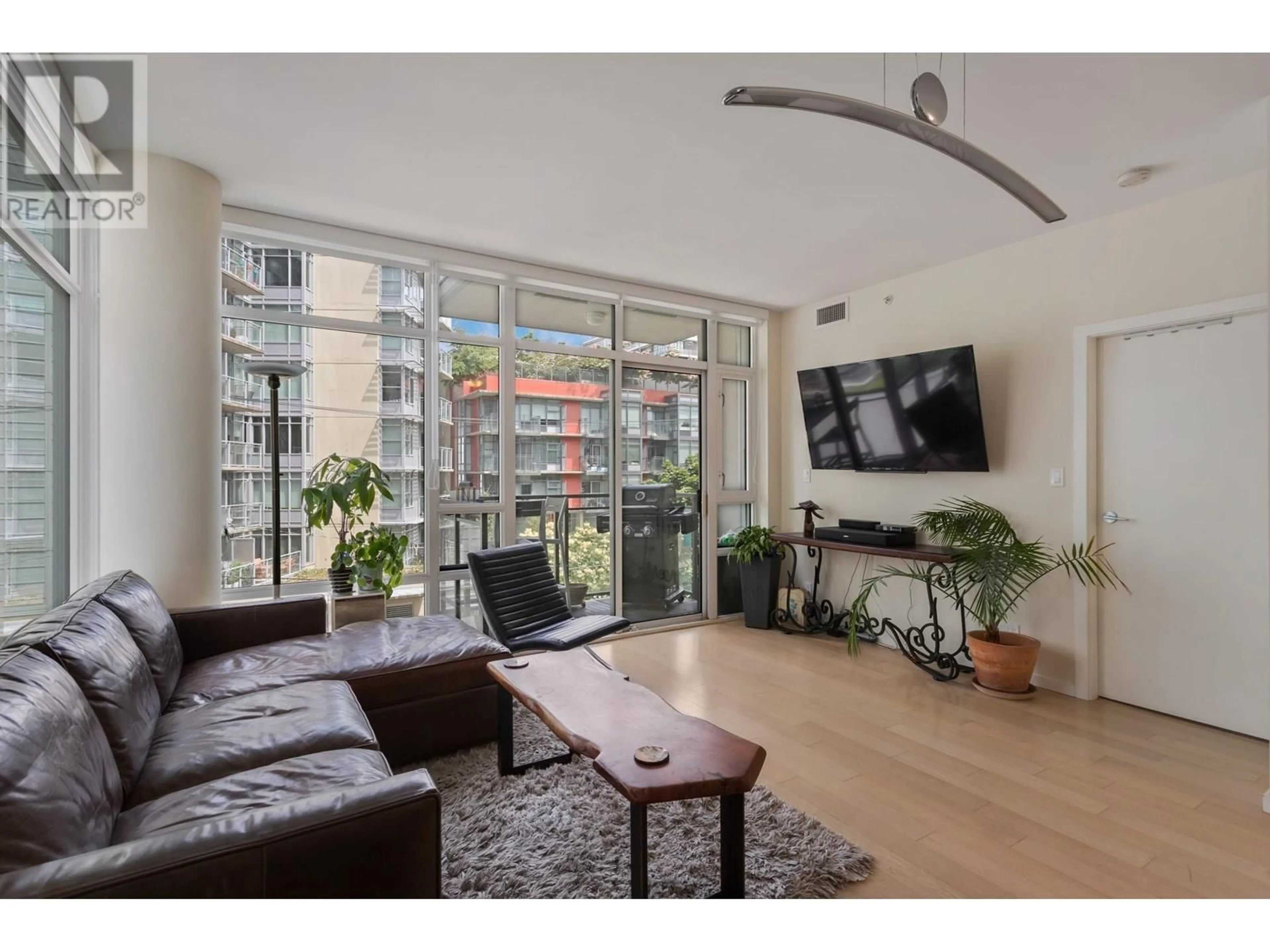 Living room with furniture, wood/laminate floor for 304 - 63 2ND AVENUE, Vancouver British Columbia V5Y0G8