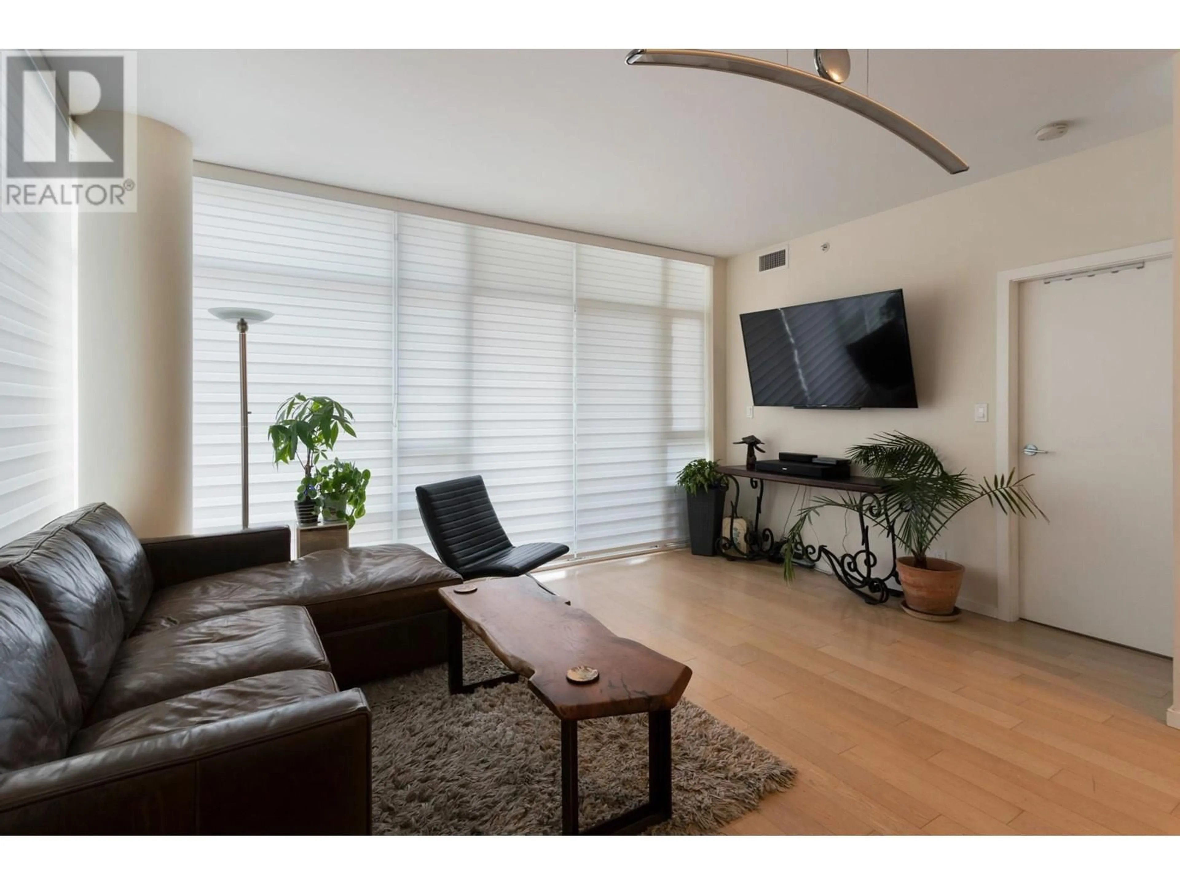 Living room with furniture, wood/laminate floor for 304 - 63 2ND AVENUE, Vancouver British Columbia V5Y0G8