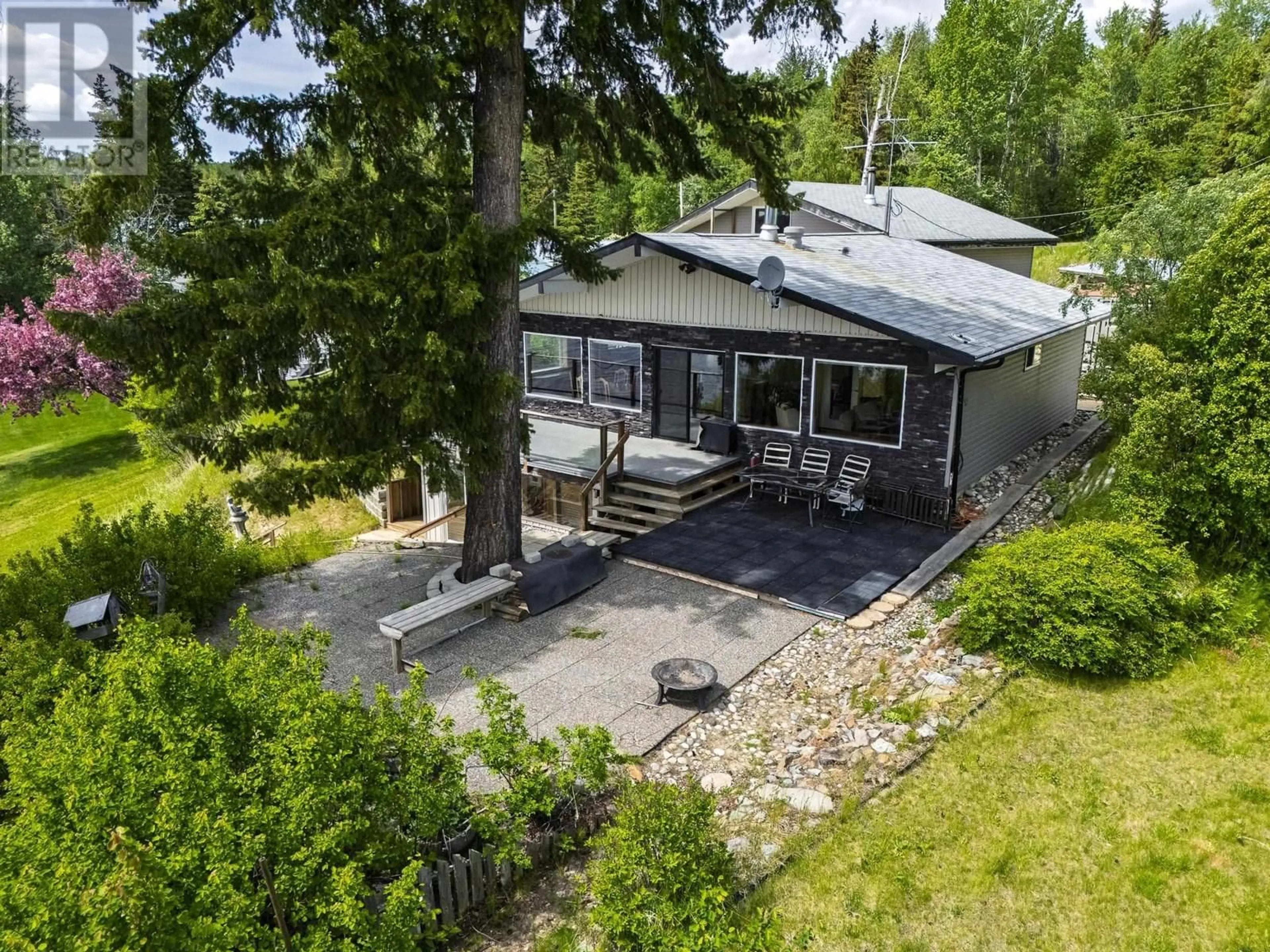 A pic from outside/outdoor area/front of a property/back of a property/a pic from drone, water/lake/river/ocean view for 25785 NESS LAKE ROAD, Prince George British Columbia V2K5N3