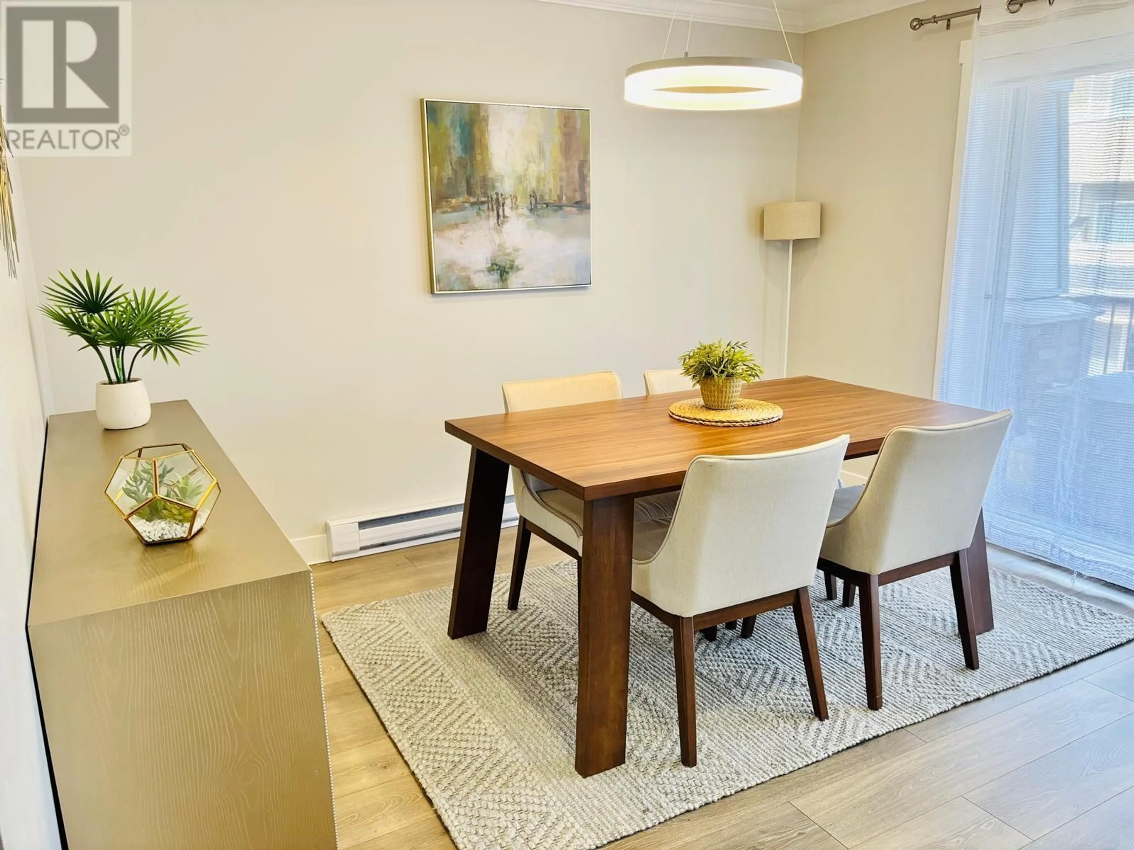 Dining room, wood/laminate floor for 208 - 1567 GRANT AVENUE, Port Coquitlam British Columbia V3B1P1