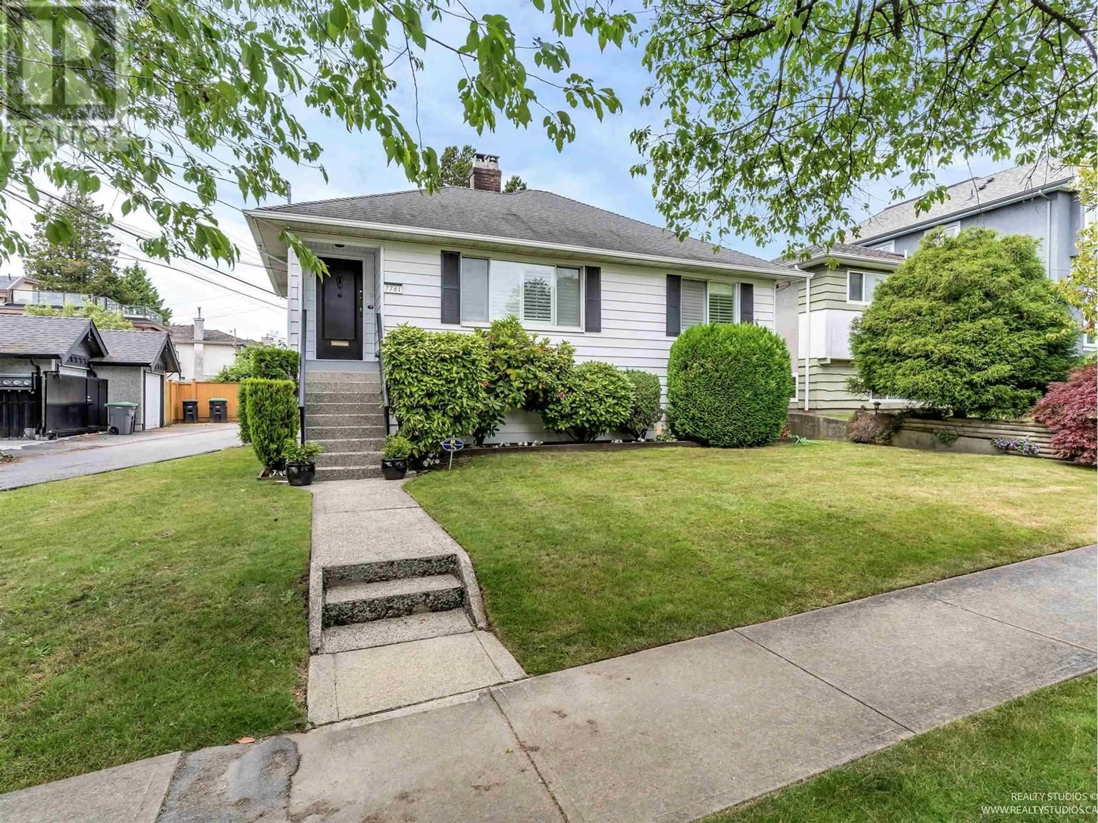 Home with vinyl exterior material, street for 7761 OSLER STREET, Vancouver British Columbia V6P4C8