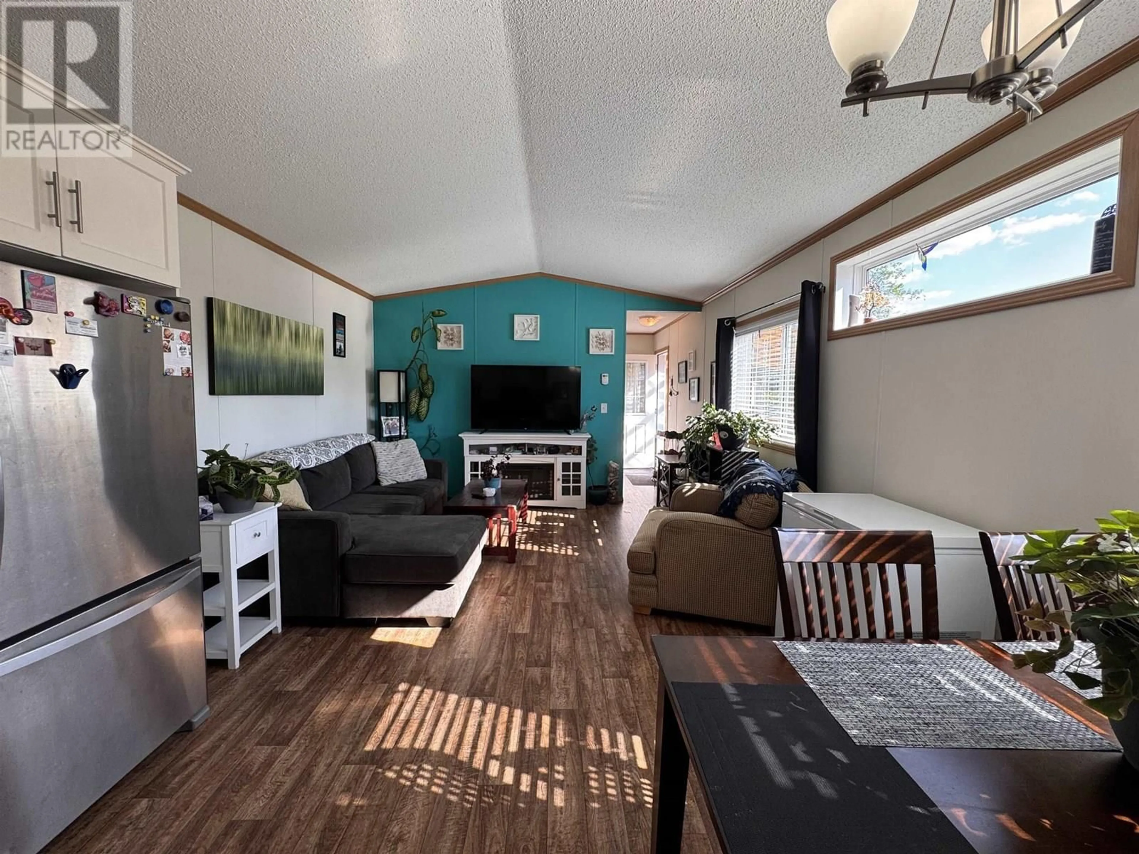 Living room with furniture, wood/laminate floor for 27 - 5204 ACKROYD STREET, Terrace British Columbia V8G1E6