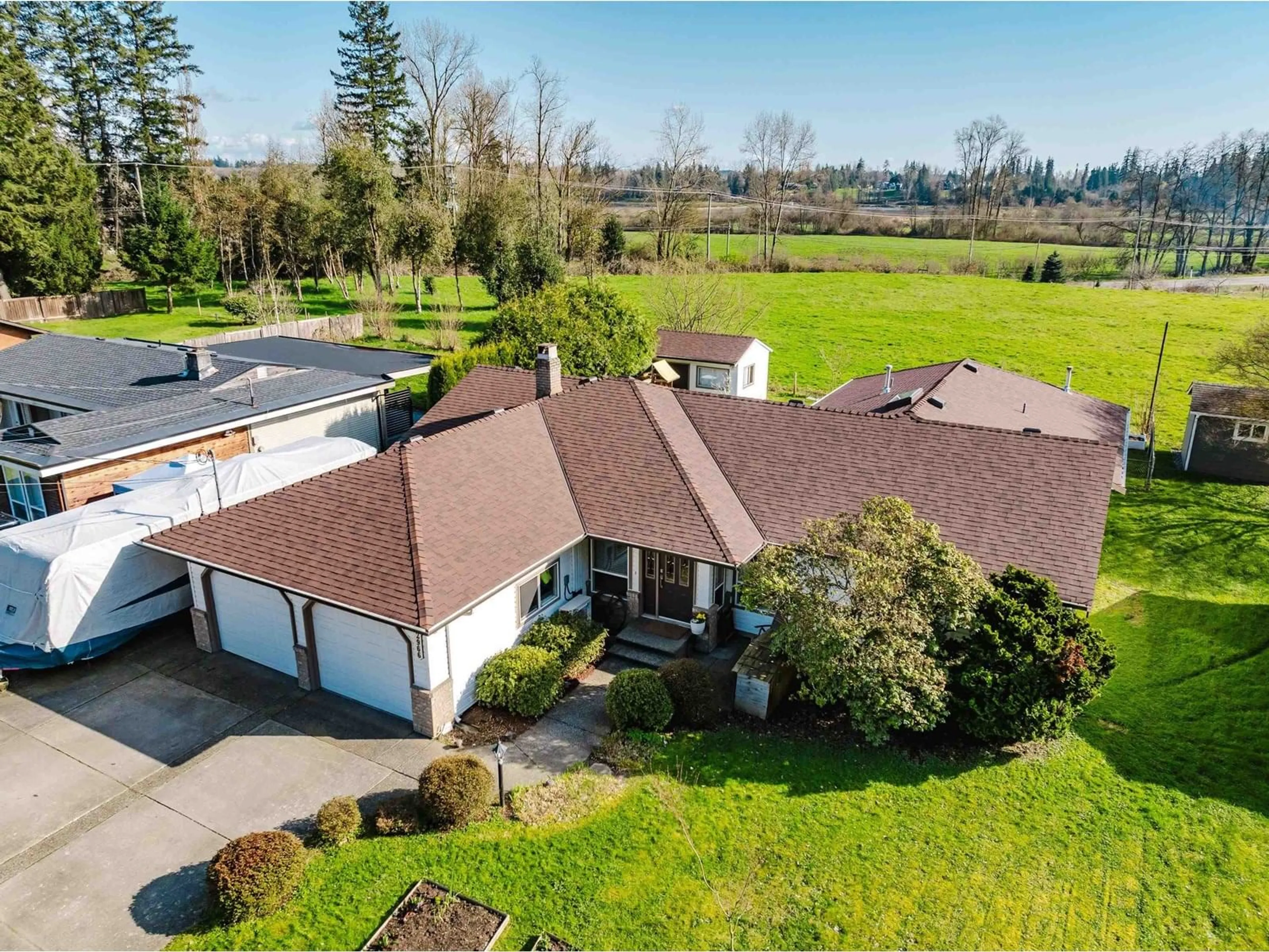 A pic from outside/outdoor area/front of a property/back of a property/a pic from drone, water/lake/river/ocean view for 22966 88, Langley British Columbia V1M2S1