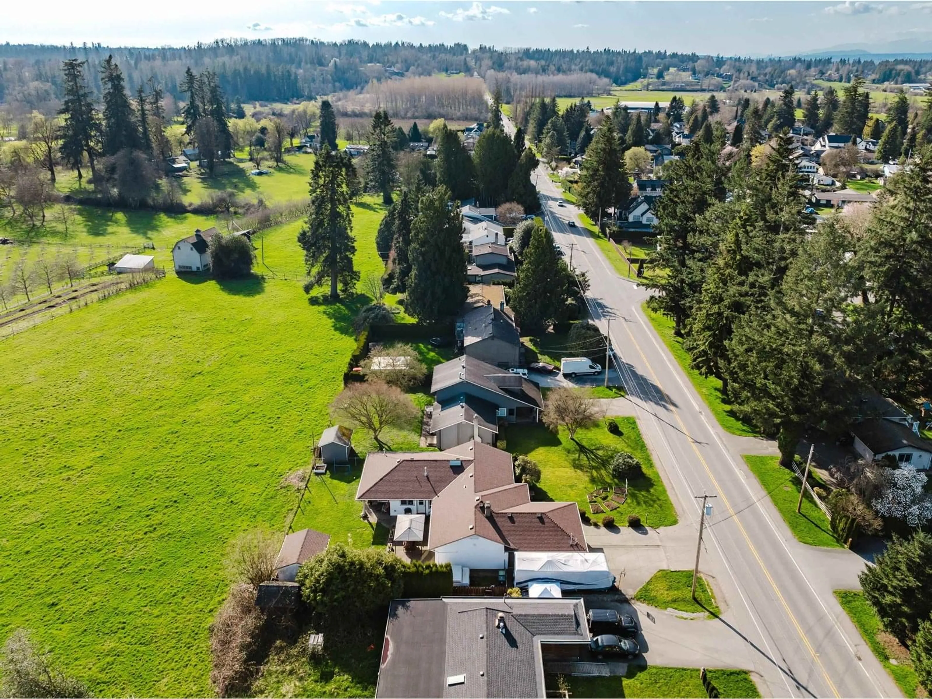 A pic from outside/outdoor area/front of a property/back of a property/a pic from drone, street for 22966 88, Langley British Columbia V1M2S1