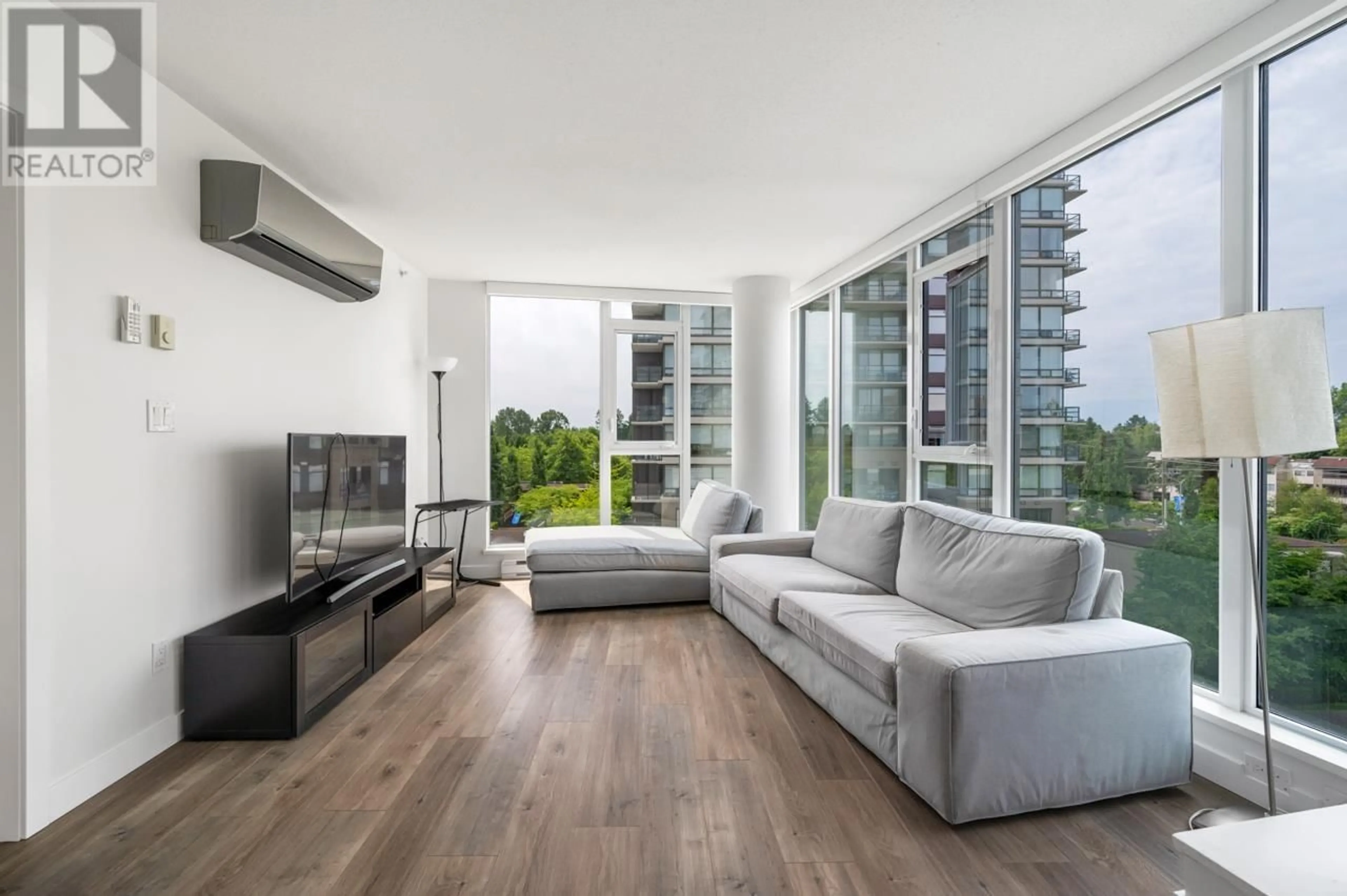 Living room with furniture, wood/laminate floor for 601 - 9099 COOK ROAD, Richmond British Columbia V6Y0G5