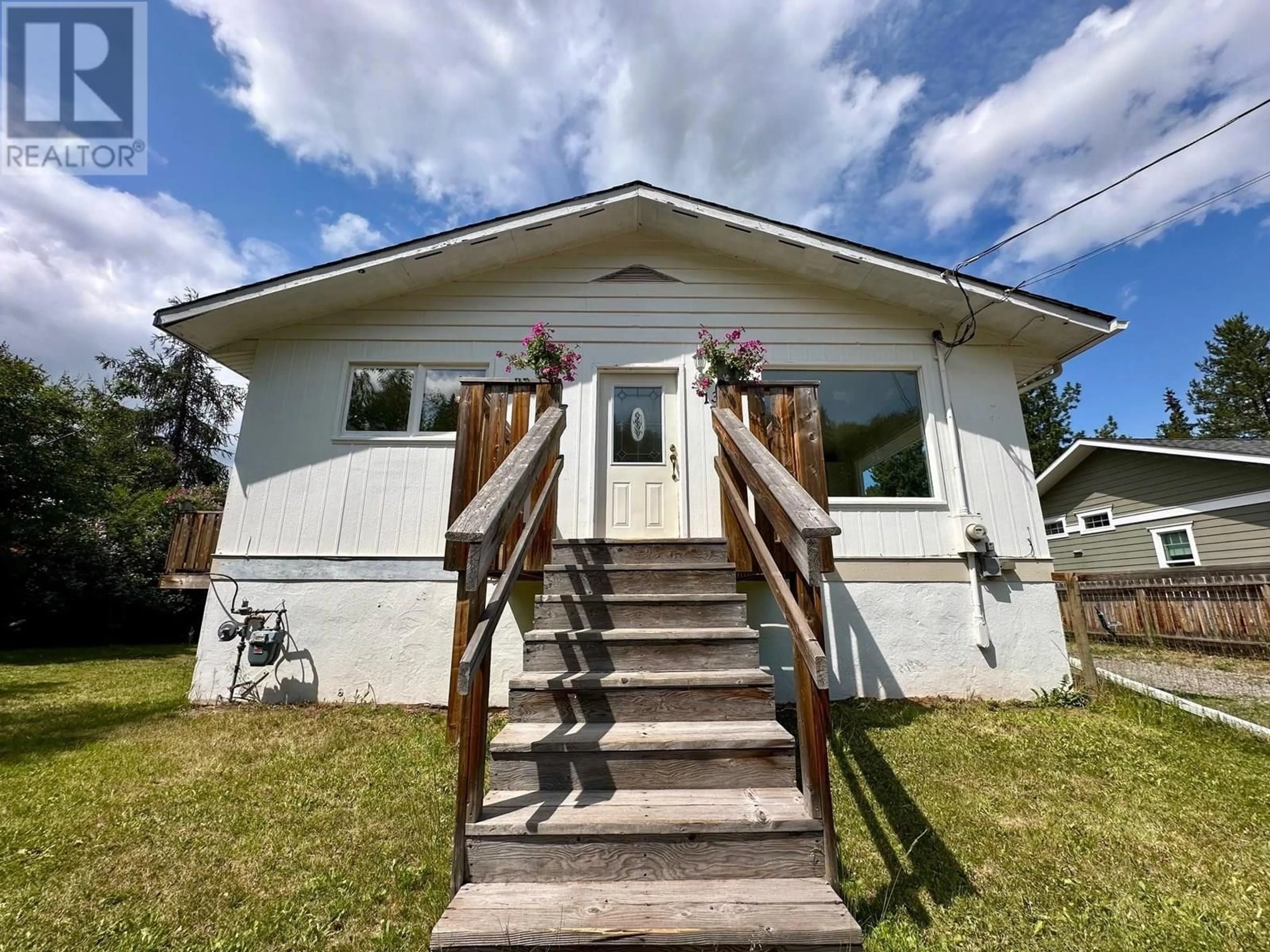 Home with vinyl exterior material, street for 1318 PINE STREET, Telkwa British Columbia V0J2X0