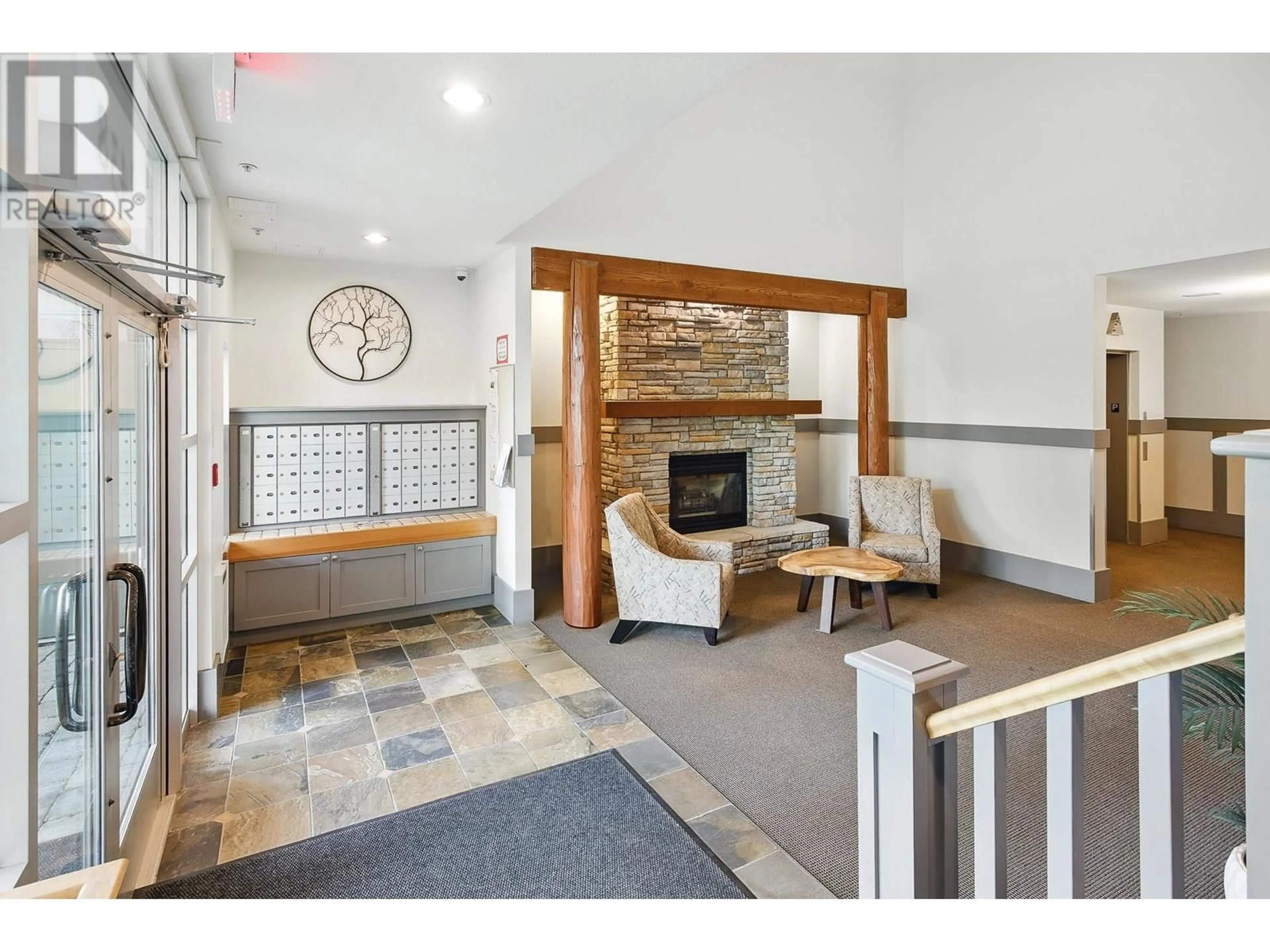 Indoor foyer for 102 - 1438 PARKWAY BOULEVARD, Coquitlam British Columbia V3E3M1