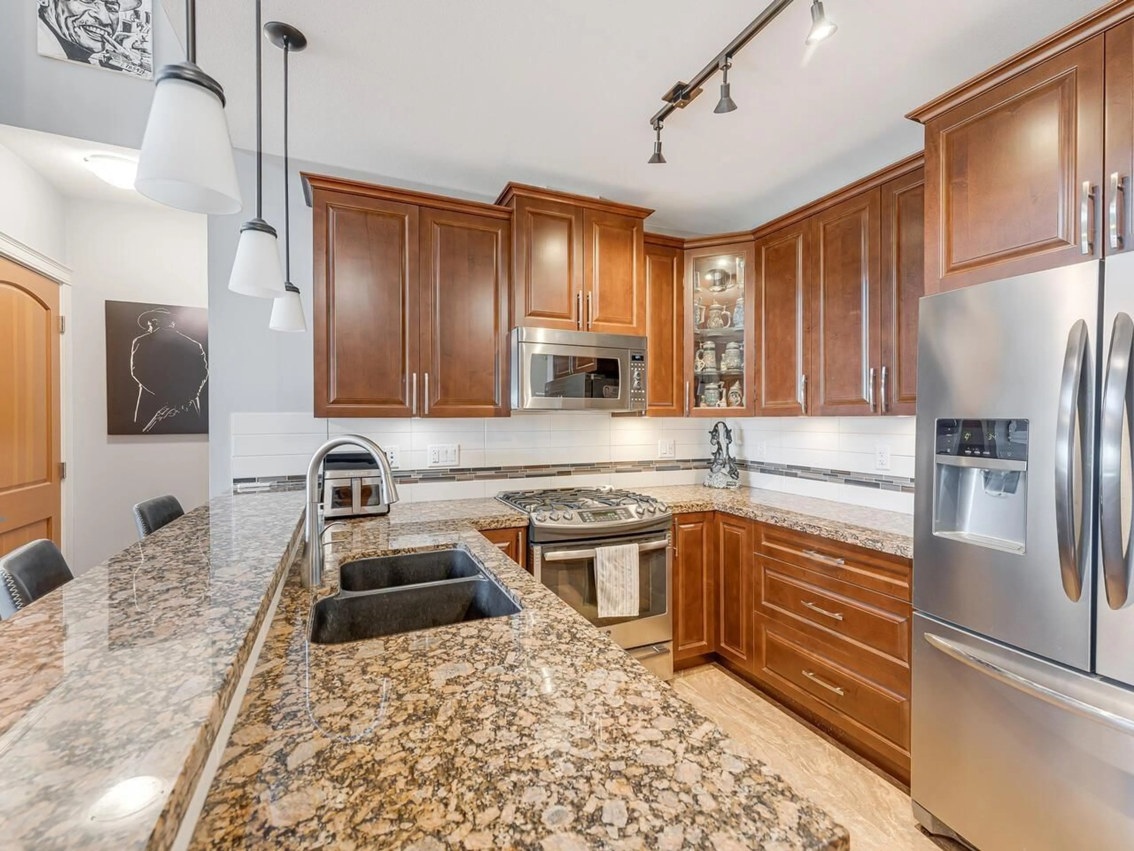 Open concept kitchen, ceramic/tile floor for 627 - 8067 207, Langley British Columbia V2Y0P1