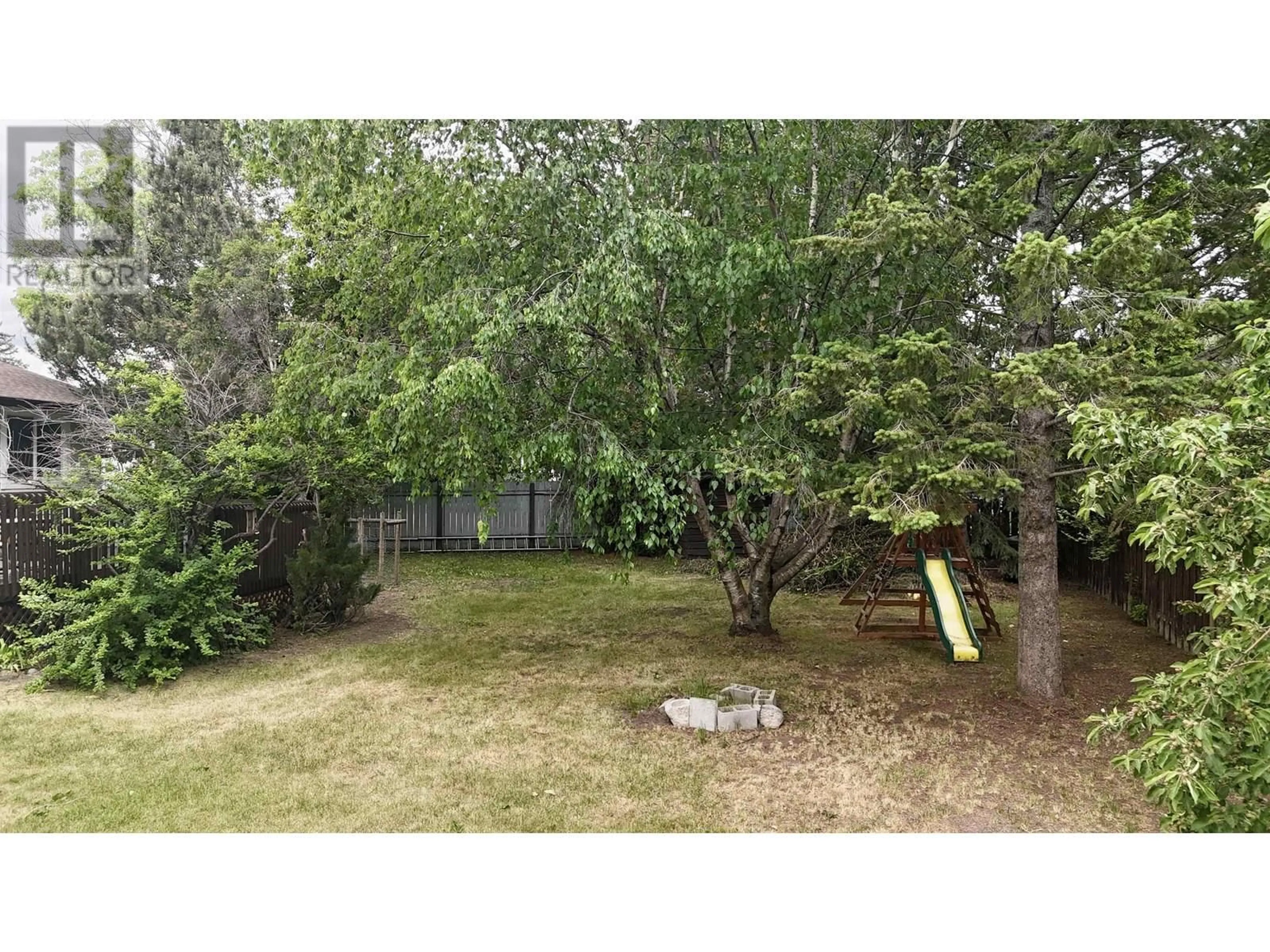 A pic from outside/outdoor area/front of a property/back of a property/a pic from drone, forest/trees view for 1130 LATIN AVENUE, Williams Lake British Columbia V2G2J9