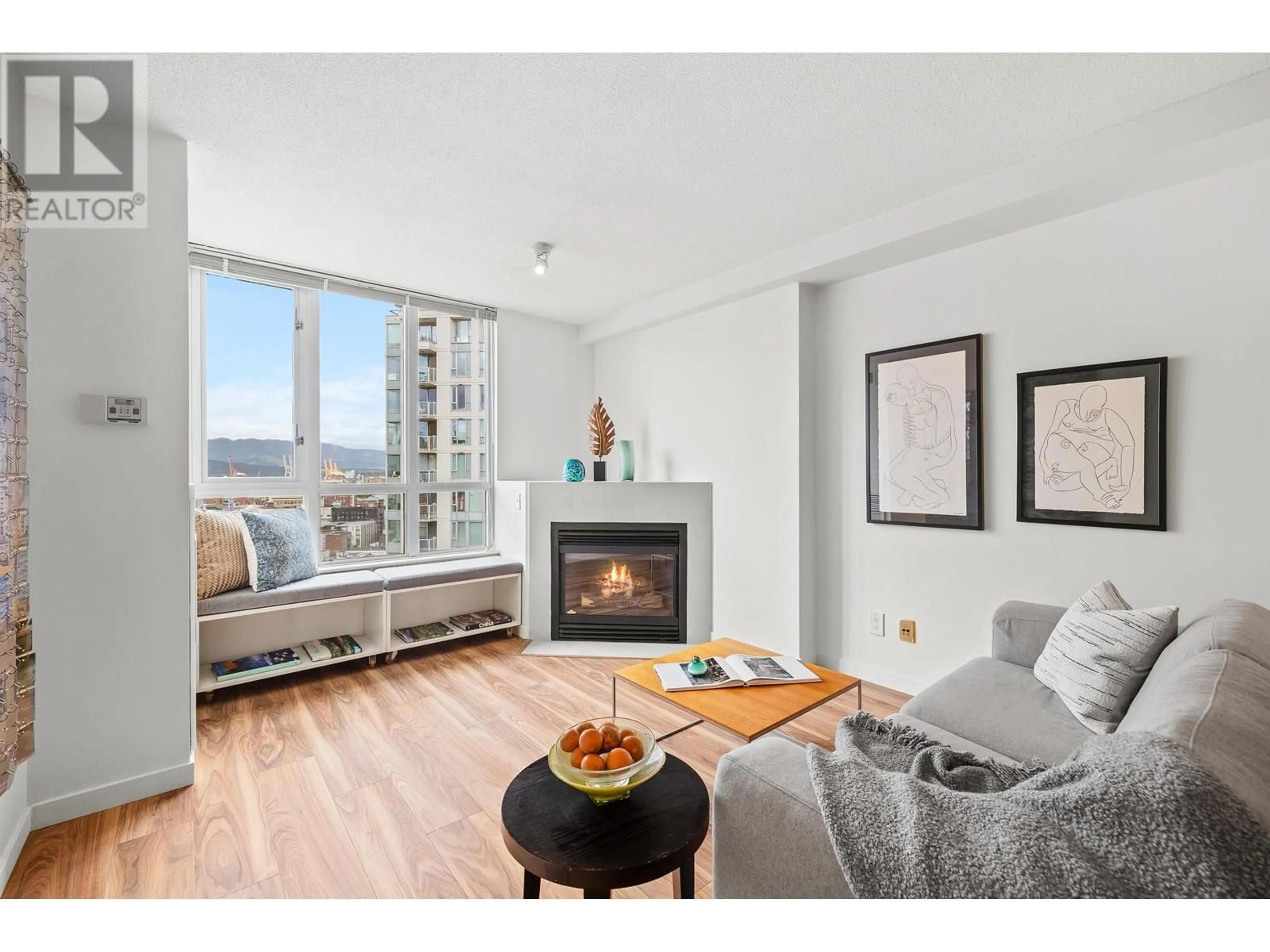 Living room with furniture, wood/laminate floor for 2307 - 63 KEEFER PLACE, Vancouver British Columbia V6B6N6