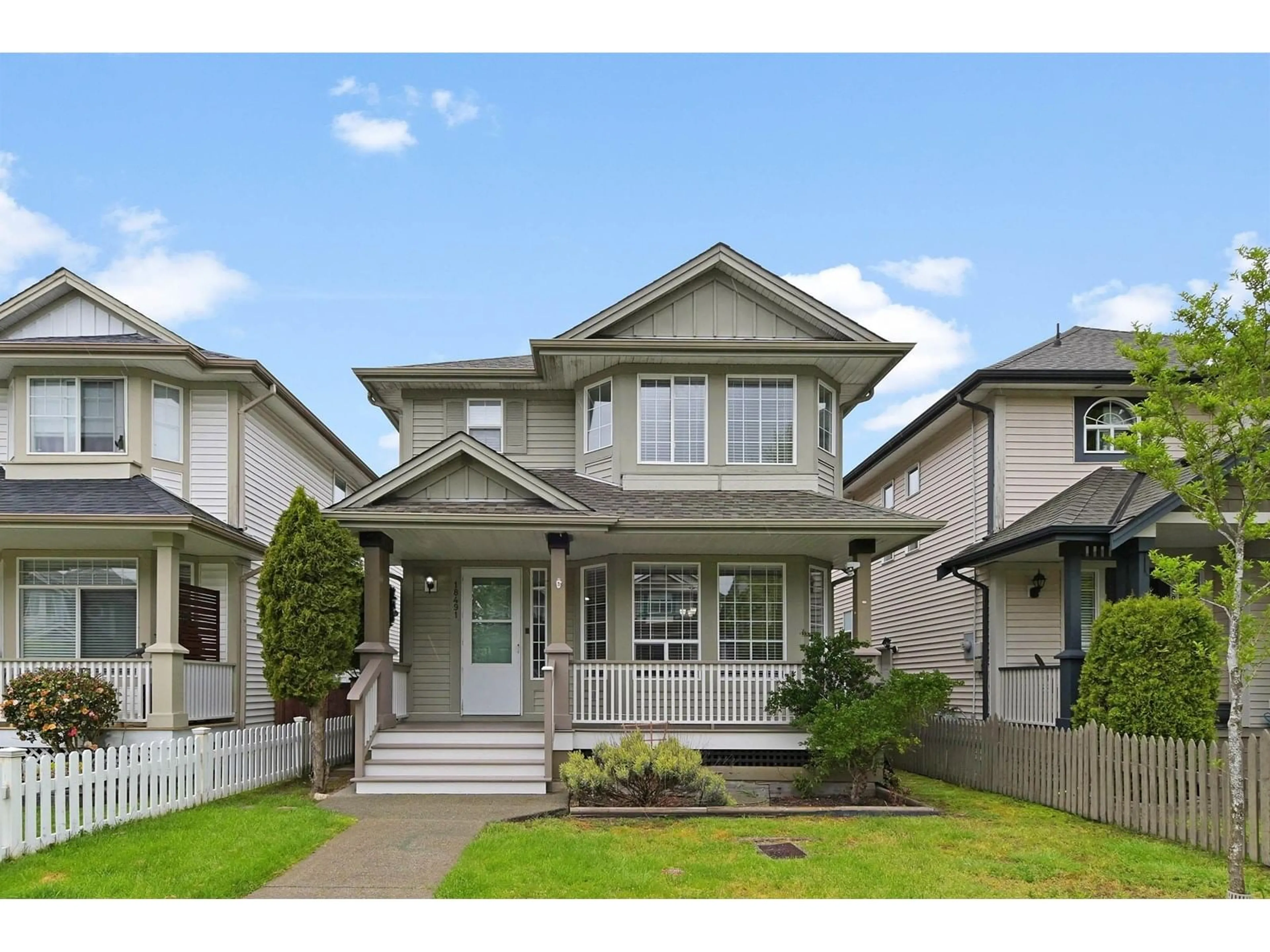 Home with vinyl exterior material, street for 18491 65, Surrey British Columbia V3S8T2