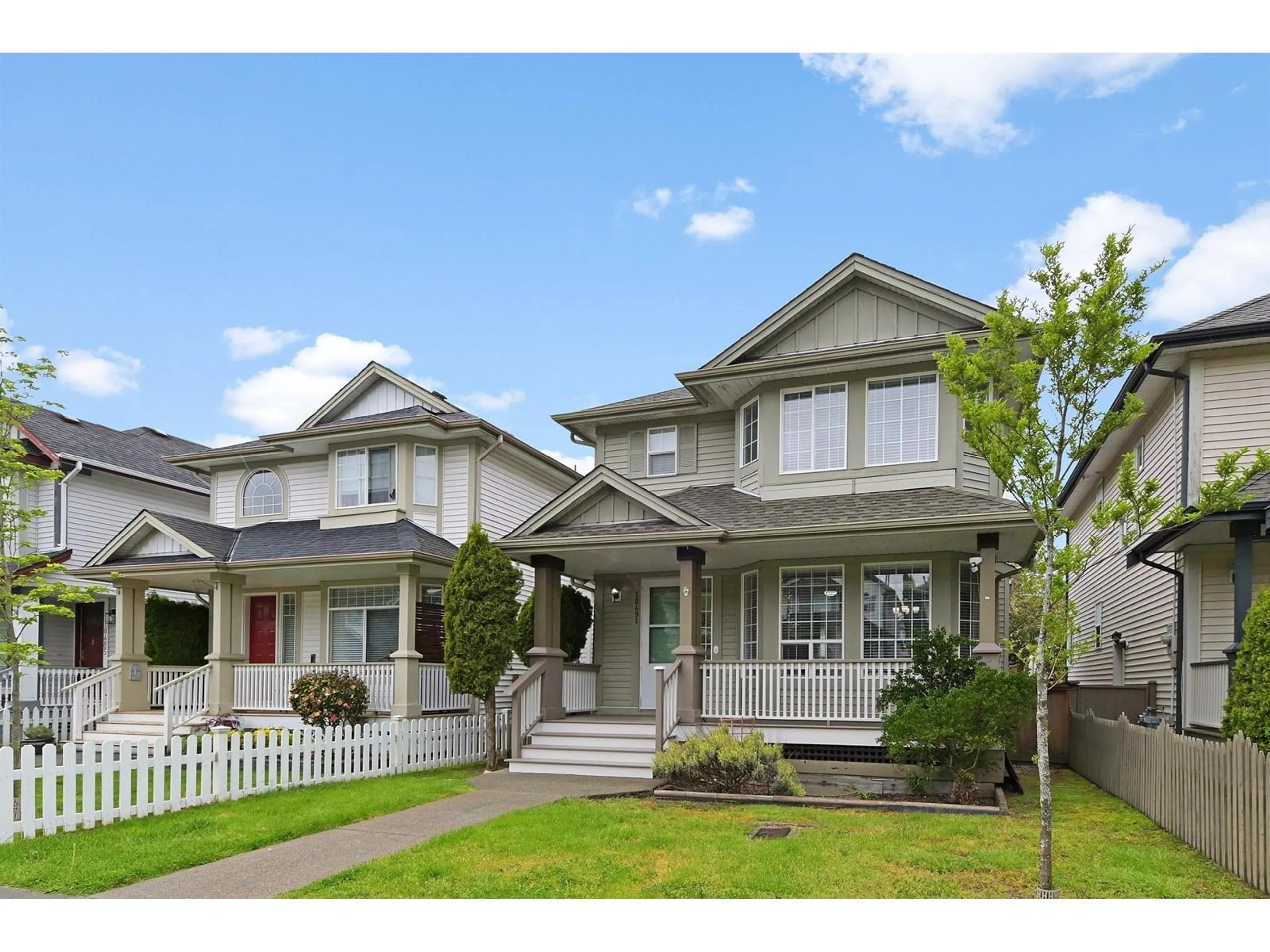 Home with vinyl exterior material, street for 18491 65, Surrey British Columbia V3S8T2