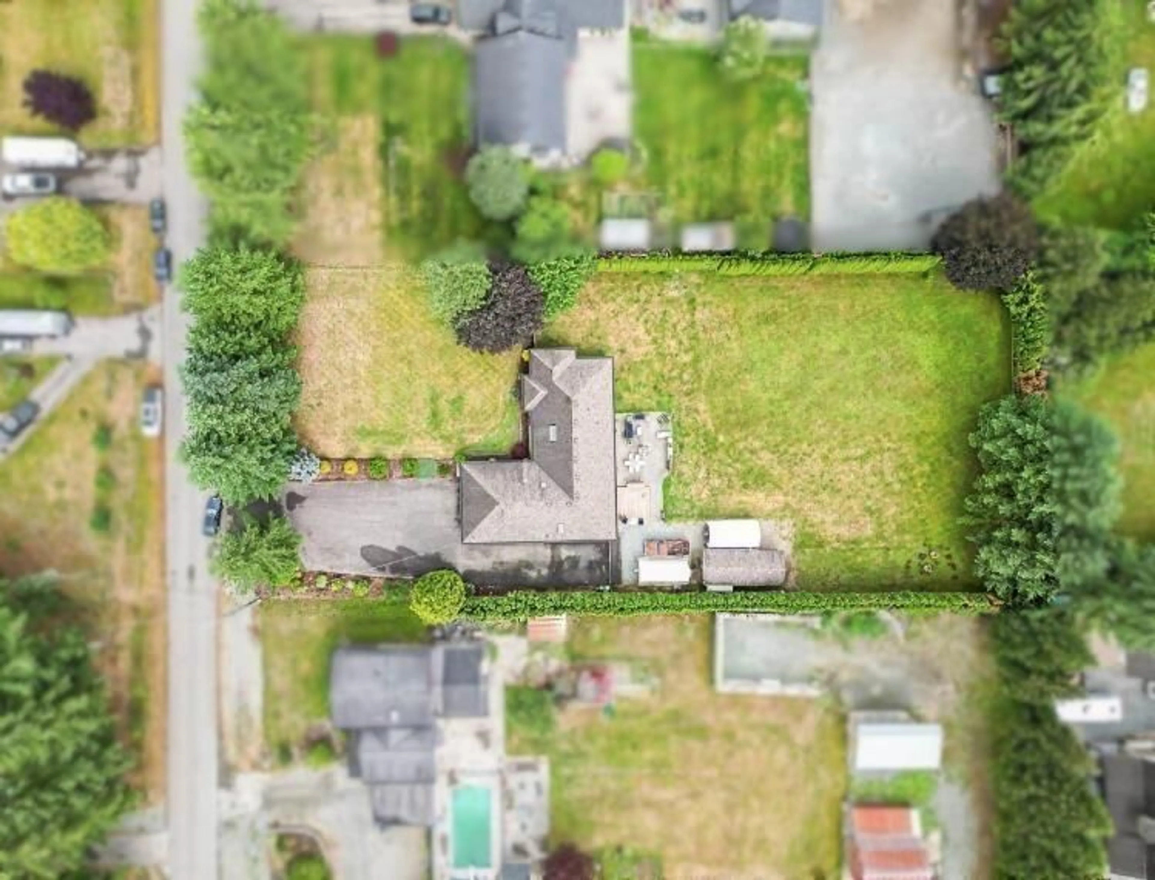 A pic from outside/outdoor area/front of a property/back of a property/a pic from drone, street for 25040 57, Langley British Columbia V4W1T6