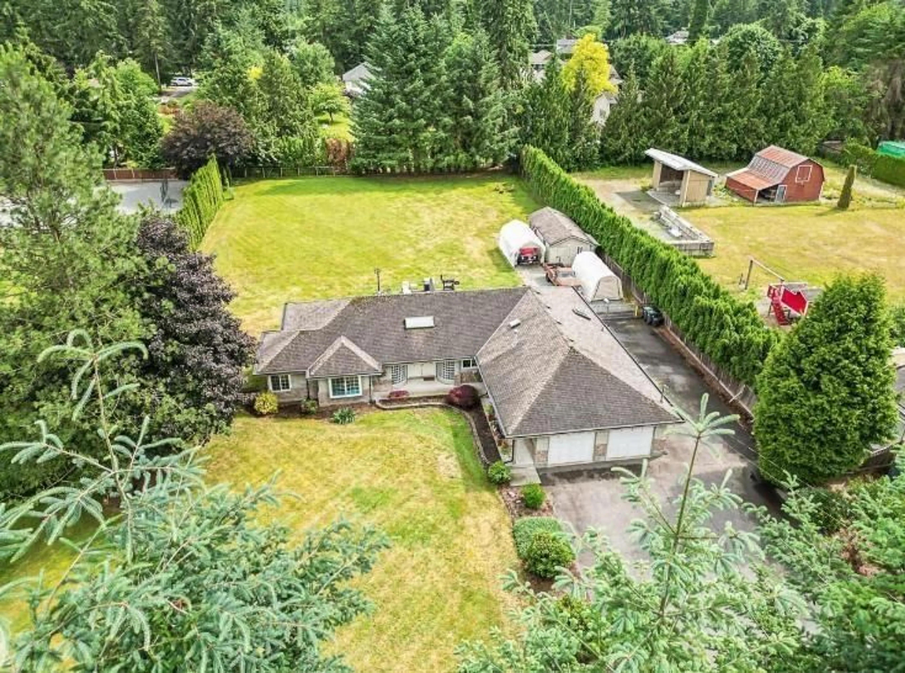 A pic from outside/outdoor area/front of a property/back of a property/a pic from drone, unknown for 25040 57, Langley British Columbia V4W1T6
