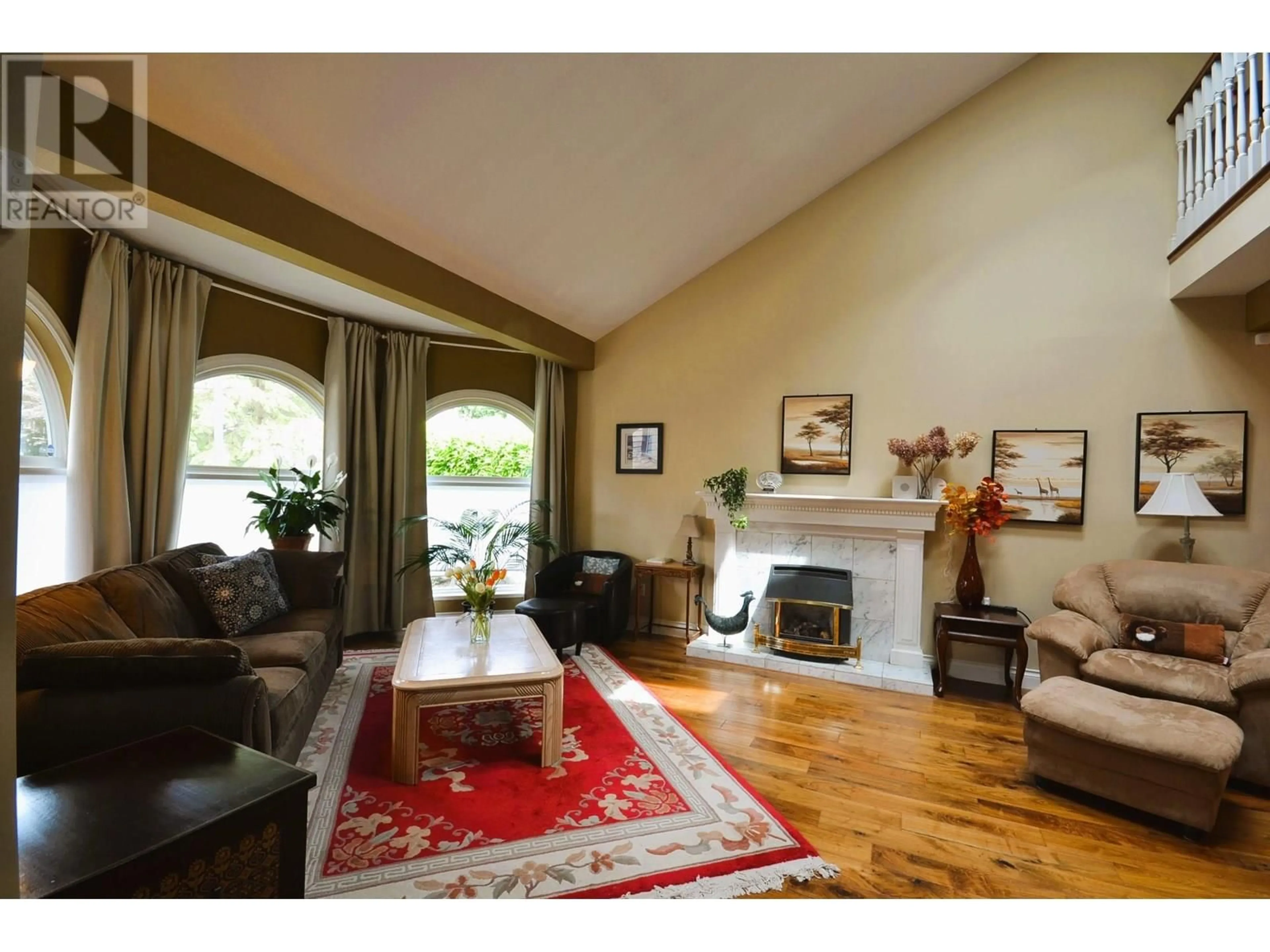 Living room with furniture, wood/laminate floor for 15 PARKWOOD PLACE, Port Moody British Columbia V3H4K7
